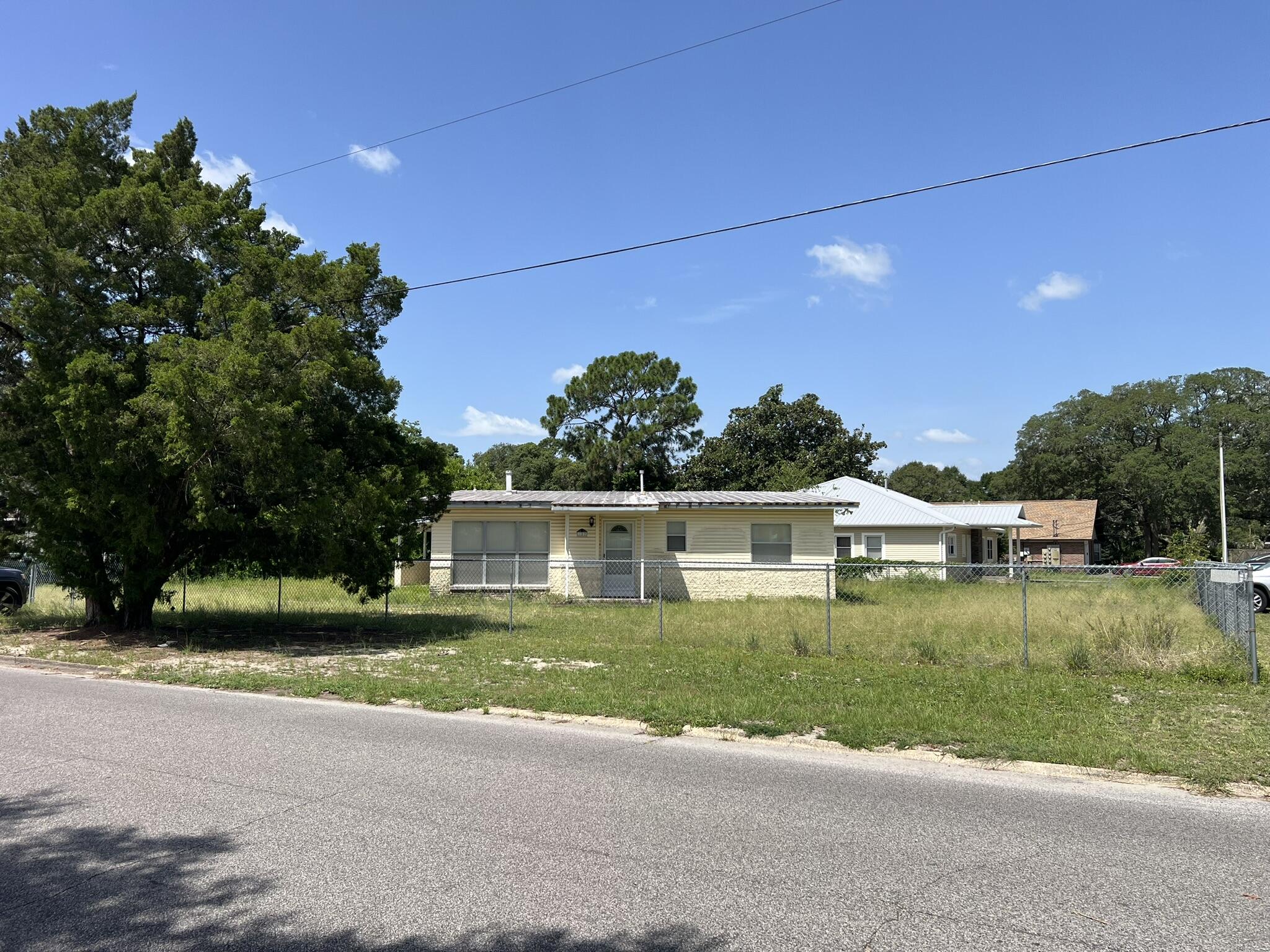 Investor Opportunity! Spacious corner lot. Home is 'As-Is' and needs complete rehab. There are no working appliances. The corner lot provides plenty of room to add-on. It is also a great candidate for new construction!  Other newish construction in neighborhood, even on the same street. Central location - convenient to beaches, employment and shopping.
