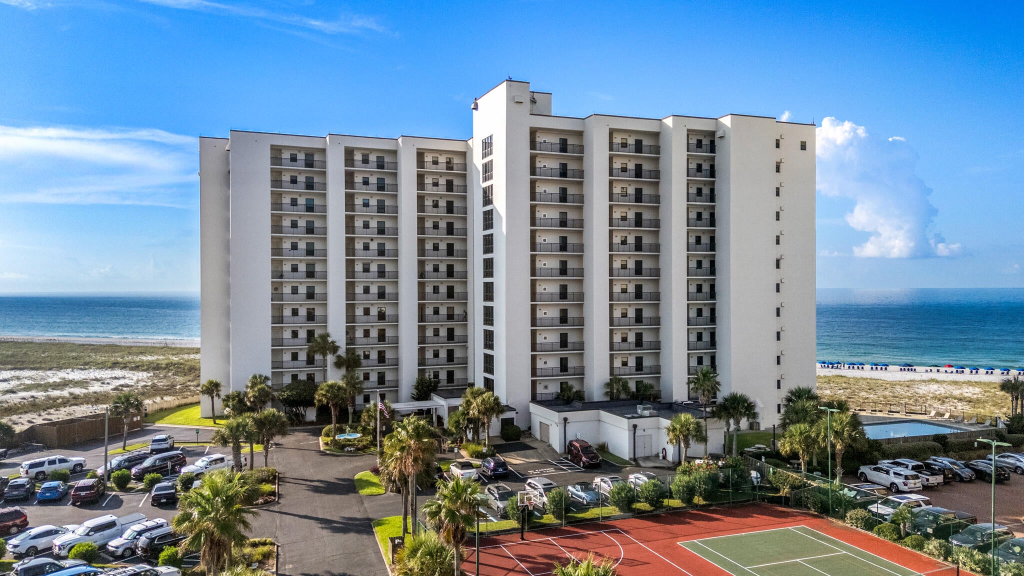 Welcome to paradise on Navarre Beach! This fully furnished, turn-key 3rd-floor condominium at Navarre Towers features 2 bedrooms and 2 full bathrooms. This spacious unit comfortably sleeps 6 guests, making it an ideal choice for a personal vacation retreat or a proven investment property with established rental income history. Offering a functional open concept main living space with tiled flooring throughout - featuring updated kitchen appliances, a breakfast bar, a dining area, an in-unit laundry room, and stunning views of the Gulf. Step directly from the open living area onto your private Gulf-front balcony to enjoy uninterrupted, elevated views of the Emerald waters and sugar white sands. The primary bedroom has an ensuite bathroom with double vanity dressing area, oversized closet, and also offers water views - to catch GORGEOUS views of the sunrise in the morning and the sunset at night. The oversized guest bedroom offers a queen bed and a twin trundle. Located within the gated Navarre Towers community, owners and guests enjoy direct beach access alongside top-tier resort amenities. The complex features a large beachfront swimming pool, basketball, tennis and pickleball courts, a fitness center, shuffleboard, and outdoor grilling areas. Schedule your showing today and make this your Emerald Coast hideaway!