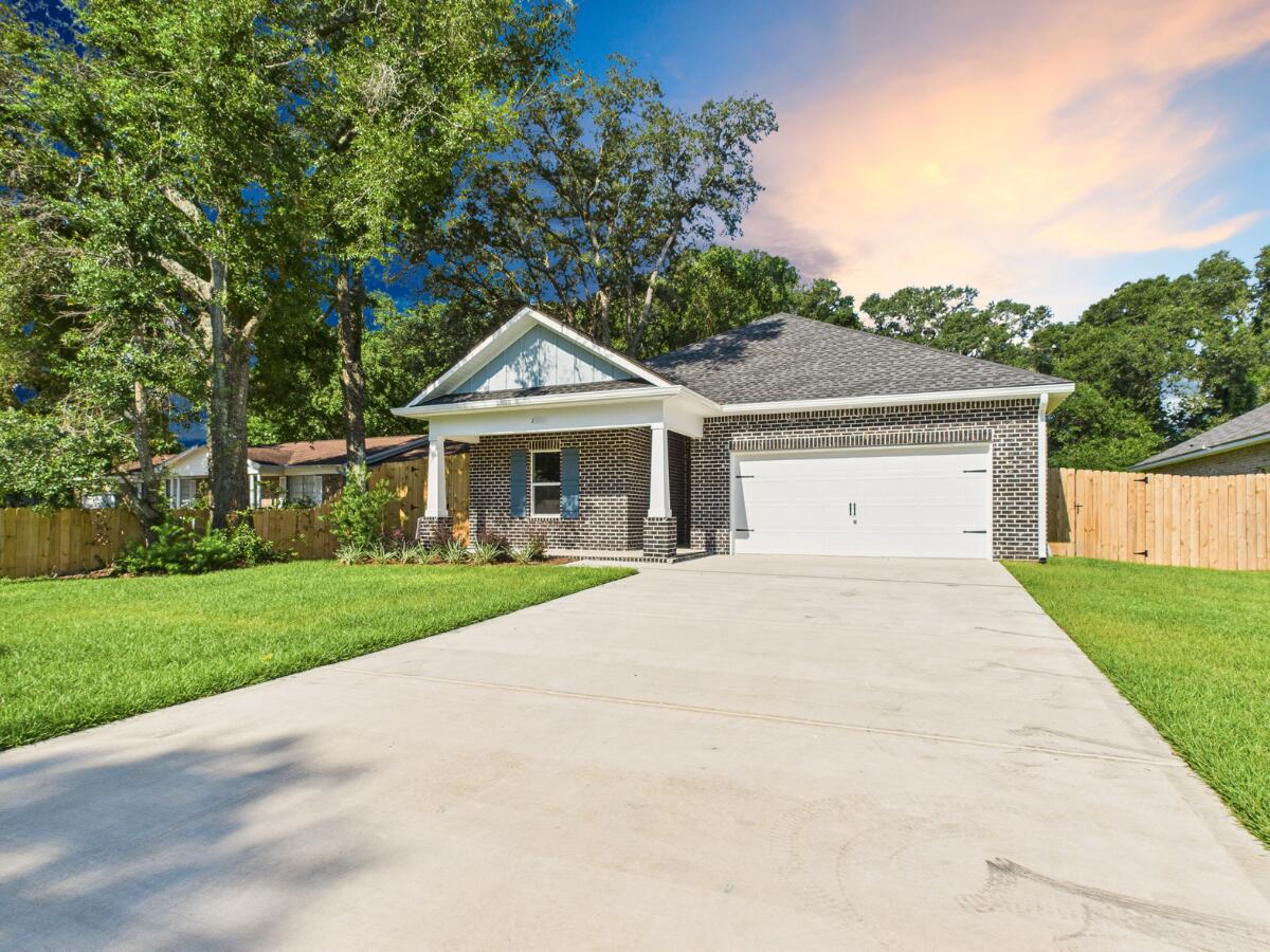Close by 6/30 and get $500 Any Bucks!! Move into this stunning 5-bedroom, 3-bathroom new construction home with 2,318 sq. ft. of thoughtfully designed living space. Perfect for multi-generational living, this home blends modern comfort with timeless charm. The upgraded kitchen showcases quartz countertops, a tile backsplash, soft-close shaker cabinetry, pendant lighting over the island, and sleek stainless steel appliances. Luxury vinyl plank flooring flows throughout, including the bedrooms. This home is filled with custom features you won't typically find in other new construction homes: 
* Designer lighting in the dining area and bathrooms
* Crown molding and cased windows for a polished finish
* Upgraded mirrors and fixtures in bathrooms
* Ceiling fans already installed
* Built-in drop zone for everyday convenience
* Laundry room cabinets for extra storage
Tray ceilings, natural gas service (heat, cooking range, dryer hookup, and tankless water heater), and carefully chosen finishes elevate the appeal even further. Builder will pay doc stamps, title fees, and the final survey. 
***4th of July INCENTIVES!!!***Builder incentives must be written into the contract and are only available with acceptable offer.