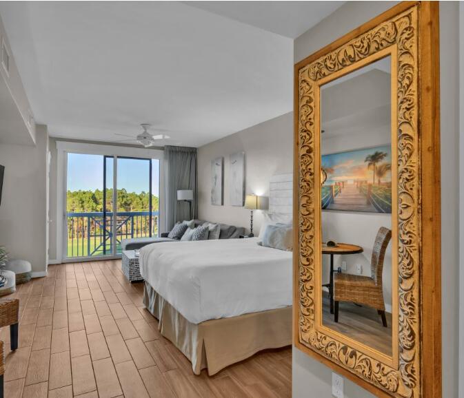 FULLY FURNISHED 4th floor studio overlooking the Burnt Pine Golf Course & lake is available for a 6 month lease beginning Aug 1. GOLF CART AND ALL UTILITIES ARE INCLUDED (water, sewer, basic cable & internet, trash removal, and $125 monthly electric cap). Wood-look tile flooring throughout this King bed studio with an electric fireplace for cozy nights! Fully stocked kitchenette and full bath. Elation is part of the Grand Sandestin Complex and located steps away from the Village of Baytowne Wharf. Enjoy shopping, dining, nightlife, and live entertainment. Walking distance to Sandestin Marina, Marina Bar & Grill, bike rentals, and tennis courts. Community pool, hot tub, and lounge area available to Tenants. Come see what the resort lifestyle has to offer!