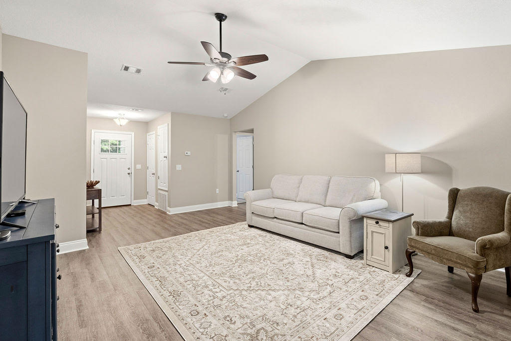 Better than new! Why buy new construction and spend thousands more on upgrades when you can move right into a one-owner, like-new home that's already complete? Built in 2022 by a respected local builder, this beautifully maintained one-owner home offers everything buyers love about newer construction - PLUS all the upgrades that aren't included with many new builds. Enjoy a privacy-fenced backyard, gutters, storage building, extended patio, established landscaping, window treatments, refrigerator, washer & dryer and a spacious lot that's ready to enjoy from day one! All this and NO HOA! Inside, you'll find a bright open-concept floor plan with luxury vinyl plank flooring throughout the main living areas, dark shaker-style cabinetry, stainless appliances, and a split-bedroom layout designed for comfortable everyday living. The neutral finishes and meticulous care make this home truly move-in ready. Step outside to a covered back porch overlooking the large fenced backyard with mature trees providing privacy that's hard to find in many newer neighborhoods. To make the move even easier, the seller is offering $7,500 toward the buyer's closing cost - a tremendous value for today's buyers. Skip the construction delays, skip the upgrade expenses, and move into a home that's already finished.
