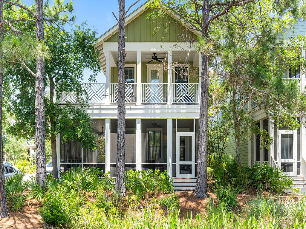 Perfectly positioned just steps from the Dragonfly Pool and overlooking the lush green space of Dragonfly Park, this charming home was designed with both comfort and entertaining in mind. The thoughtfully curated floor plan offers four bedrooms, two of which feature primary suite configurations, alongside four and a half baths, as well as a charming built-in bunk room ideal for guests or younger visitors. The first level primary suite provides ease and privacy, while multiple living areas, including a spacious second floor retreat, create an effortless flow for gathering and relaxation. Rich hardwood floors run throughout, complementing the home's timeless coastal aesthetic. 
Offered fully furnished, the home is move-in ready and equally suited as a primary residence, second home, or investment property. Outdoor living is equally inviting, with a generous wraparound screened porch overlooking the park and a second level wraparound balcony, ideal for morning coffee or evening cocktails under the coastal breeze.
Residents of WaterColor enjoy an unmatched lifestyle, with access to the private beach club, resort-style pools, fitness center, tennis and pickleball courts, scenic walking and biking trails, and the boathouse on Western Lake for paddleboarding and kayaking. All of this, just moments from celebrated dining, boutique shopping, and entertainment along 30A. This is an exceptional offering in a premier location so schedule your private showing and experience the very best of WaterColor living.