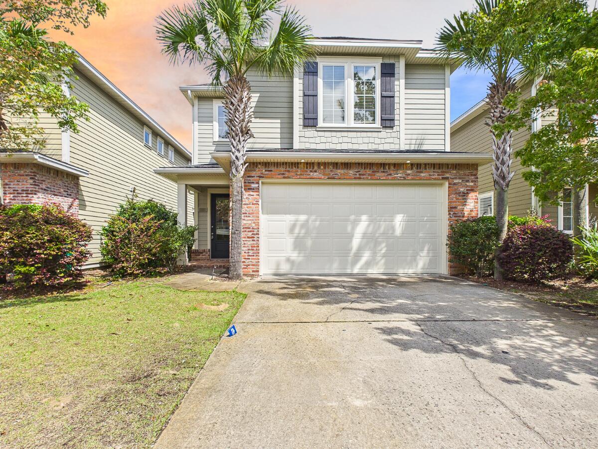 Introducing 4286 Skipjack Cove, a stunning coastal bungalow nestled in the highly sought-after Marina Landing community. Perfectly positioned within walking distance of the natural cove marina at Bluewater Bay, this home offers an idyllic lifestyle for boat lovers and golf enthusiasts alike. From the street, you are welcomed by the home's exceptional curb appeal, featuring professional landscaping (HOA will re-sod all of the homes in the next few months), a two-car garage, and a freshly painted ''Florida-style'' exterior finished with durable HardieBoard and classic brick accents. The residence is designed to balance modern luxury with relaxed coastal living, characterized by an open floor plan that flows effortlessly from the moment you step into the crown-molded foyer. The heart of the home is a gourmet kitchen equipped with granite countertops, stainless steel appliances, custom cabinetry with concealed hinges, and a convenient breakfast bar for casual dining. Throughout the main living areas (including the foyer, dining room, and kitchen) you will find beautiful decorative tile, 9' ceilings, and 8' raised panel doors. The primary suite serves as a spacious private retreat, while the upper-level loft provides the ultimate versatile space, perfect for a media room, home office, or secondary lounge. Attention to detail is evident in every corner, from the cultured marble bathroom vanities to the energy-efficient vinyl insulated windows and pre-wired stereo system. Whether you are hosting a dinner in the formal dining area or relaxing in the sun-drenched living room, the home's designer touches and high-end finishes create an atmosphere of sophisticated comfort. Outside, the fenced yard offers a private sanctuary to enjoy the Florida sunshine. Whether envisioned as a primary residence or a premier second home, this Marina Landing gem offers a rare opportunity to enjoy the best of the Emerald Coast.