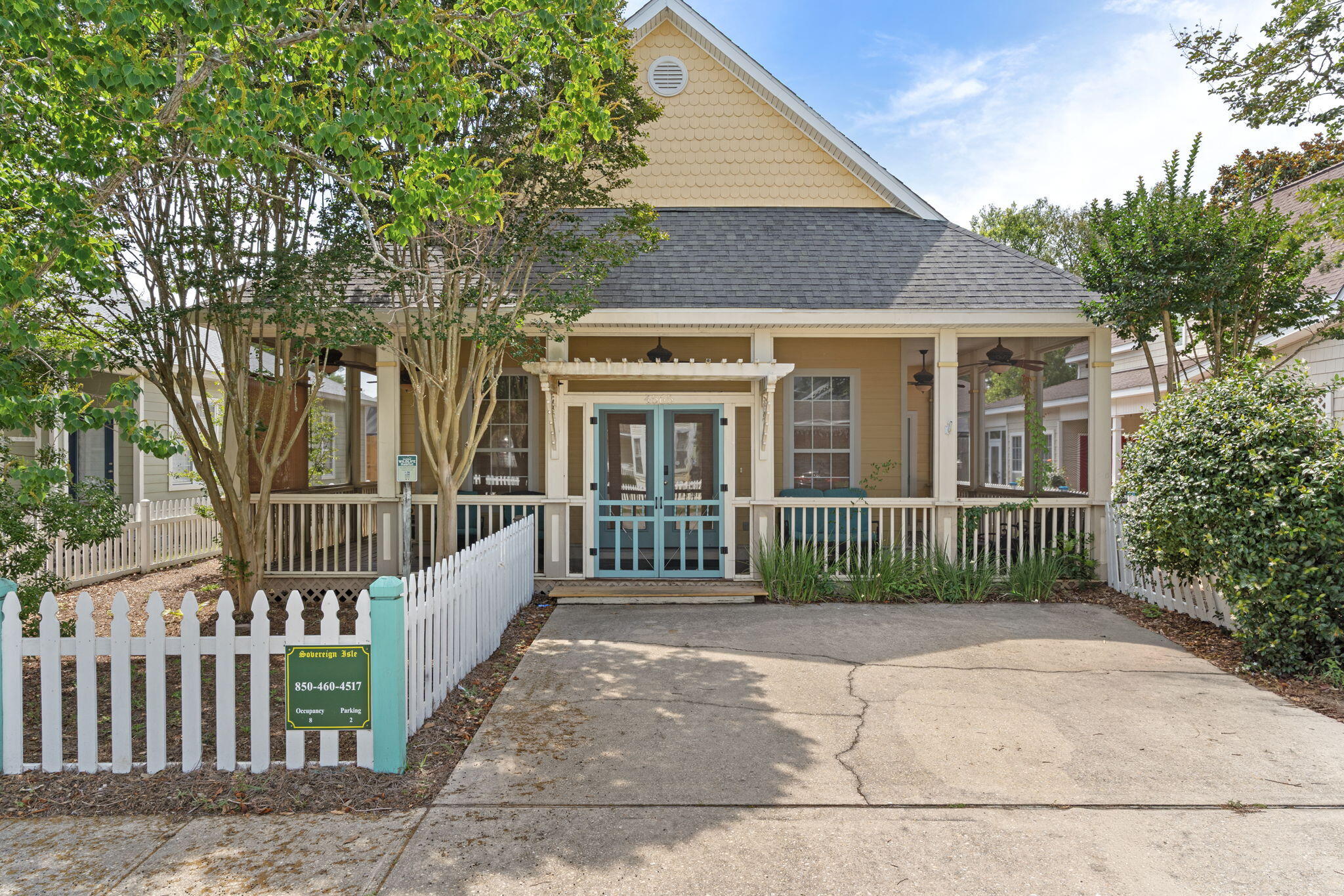 A must see beautiful Florida cottage!!  Beautiful hardwood, tile and carpet. Over sized bedrooms, open floor plan that is perfect for entertaining. Community pool, just steps from the beach. Wrap-around screen porch, white picket and fence enclosed yard.  Master bedroom has private entrance, walk-in closet, jetted tub, separate shower and dual sinks.
