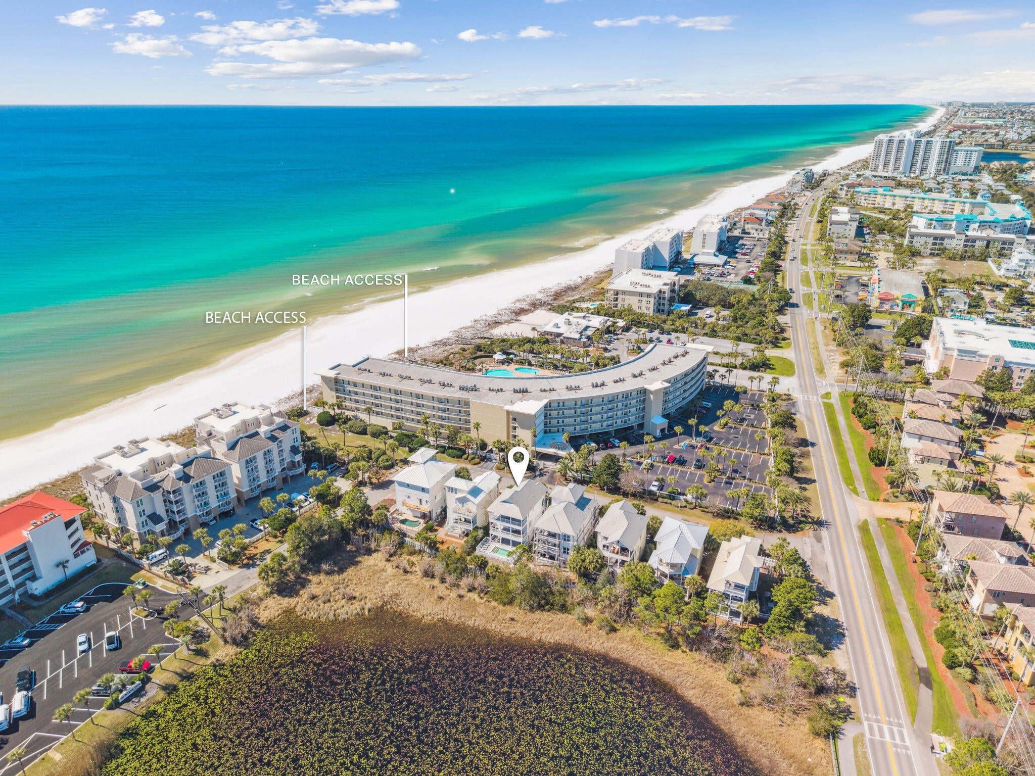 Welcome to your dream coastal retreat in the heart of Miramar Beach. This beautifully updated 4-bedroom, 4.5-bath home offers nearly 2,900 square feet of thoughtfully designed living space just moments from the sugar-white sands and emerald waters of the Gulf.

Perfectly positioned on a serene lakefront lot, the home blends relaxed coastal elegance with functional design and exceptional indoor-outdoor flow. The open-concept living, dining, and kitchen areas create an inviting atmosphere ideal for entertaining. Large windows invite in natural light while framing tranquil water views, and the well-appointed kitchen provides ample space for hosting family and guests with ease.