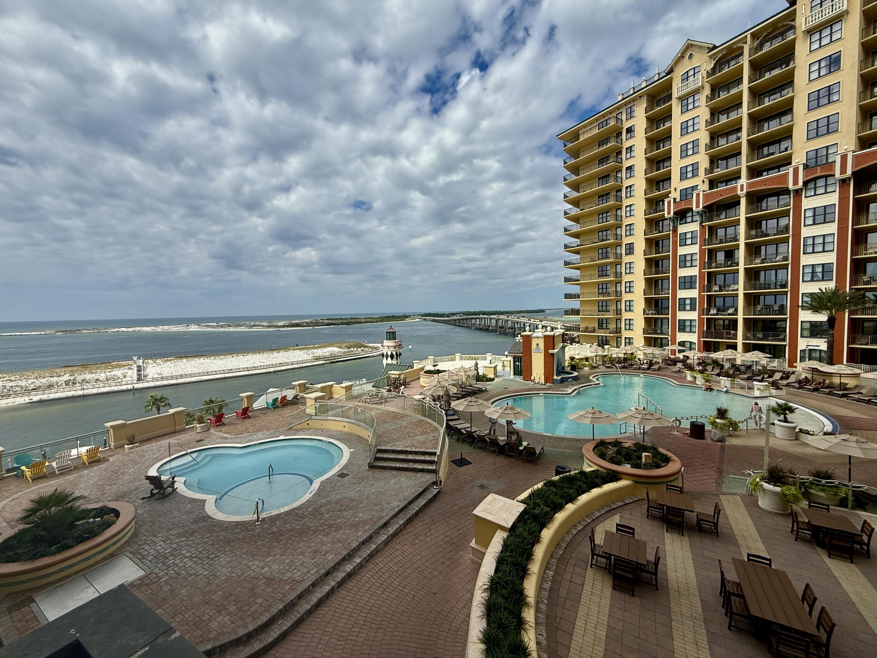 Fractional Ownership! Share B for sale. 6 Weeks of Usage each year! Water views include the East Pass, Destin Bridge, Crab Island and the Gulf of Mexico. Amenities galore include The Spa at Emerald Grande offering 11 treatment rooms for individual and couple treatments, East Pass fitness center with cardiovascular equipment and free weights, water beach shuttle that will take owners to Destin's famous pristine, white beaches, 2,500 square foot Grande Vista Pool Deck, and much more. Don't miss out on this Grande ownership opportunity.