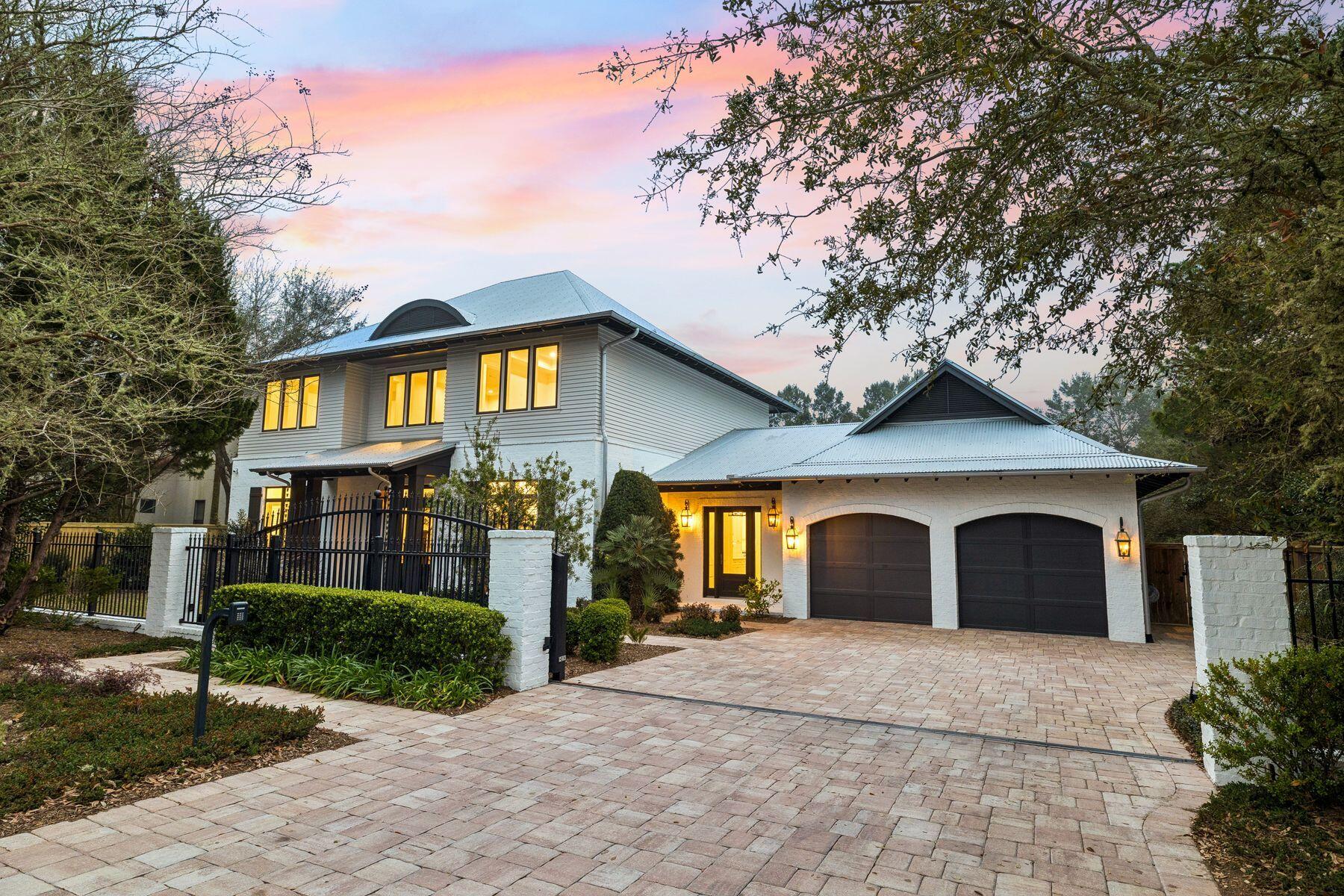 Located on the west end of Scenic Highway 30A, 67 Sunset Avenue is a well-designed residence offering flexibility as a primary residence, second home, or investment property. The home rests on a large, private lot surrounded by mature trees, providing a quiet setting less than a mile from Butler Elementary, Tops'l Hill State Park, and the Beach Highlands neighborhood beach access. Originally built as a personal residence by a residential contractor, the home reflects thoughtful planning, solid construction, and practical design. Recent updates include renovated bathrooms, improvements to the second-floor wet bar area, and a refreshed pool. The exterior combines brick construction on the lower level with Hardie siding above, along with a quality roof and a two-car garage.

The home was designed for convenient first-floor living. The main level includes the kitchen, living and dining areas, laundry, a flexible office or bedroom space, and the primary suite.

The welcoming foyer opens to a flexible room with cypress doors and a closet, ideal for a formal dining room, office, or additional bedroom. The living and dining areas connect naturally to the kitchen and feature pecky cypress accents that add warmth and architectural character. A NanaWall glass door system opens the living area directly to the pool and lanai, creating a seamless indoor-outdoor living experience.

The kitchen is designed for both everyday living and entertaining. Features include quartz countertops, distressed oak cabinetry, a large island, and extensive drawer storage. The appliance package includes a Thermador gas range with vent hood, Thermador refrigerator and freezer units, Thermador dishwasher, microwave, and a wine refrigerator. Pull-out pantry drawers and self-closing cabinetry provide excellent organization and functionality.

The primary suite is positioned to enjoy the outdoor setting and includes direct access to a private porch overlooking the pool. The bedroom features updated flooring, a pecky cypress ceiling, and a cypress door, and includes a bed that will remain with the property. The primary bathroom includes large closets, pale gray-blue marble tile flooring, tall ceilings, decorative tile details, a soaking tub, separate shower, water closet, and a dedicated makeup vanity.

Outdoor living is one of the most compelling features of the property. The large, fully fenced backyard centers around a newly renovated pool with a hot tub and fire features integrated into natural stone. The yard provides additional space for a garden, play area, or expanded outdoor living, and includes a separate storage building.

A screened indoor-outdoor lanai allows for year-round enjoyment and includes an outdoor kitchen, pecky cypress ceiling, stone flooring, fireplace, cross-ventilation, and an outdoor shower. Additional main-level features include a half bath, extensive storage, and a converted garage space that can serve as a gym, playroom, or additional living area. This space includes built-in cabinetry, attic access, and a central vacuum system.

Upstairs, the home provides generous space for family and guests. A secondary living area offers a comfortable place for television or relaxation. One bedroom features abundant natural light, a beadboard ceiling, and a private updated bathroom with penny tile flooring, quartz surfaces, and a spacious shower.

The upper level also includes a bar area with refrigerator, sink, drawers, and storage, offering additional convenience for guests. A large flexible room can function as an oversized bedroom, bunk room, media room, or game room and opens to a porch overlooking the pool and back yard. Additional spacious bedrooms and a Jack-and-Jill bathroom with new cabinetry and penny round tile complete the second floor.

The overall design of the home prioritizes comfort, functionality, and flexible living. With primary living on the first floor and generous guest accommodations upstairs, the home works equally well as a primary residence, second home, or investment property along Scenic Highway 30A.

Homes offering this combination of privacy, outdoor living, and proximity to beach access and state park land are increasingly rare on the west end of 30A. Buyers seeking a well-built home with space to live, entertain, and enjoy the coastal lifestyle are encouraged to schedule a private showing to fully experience the property.