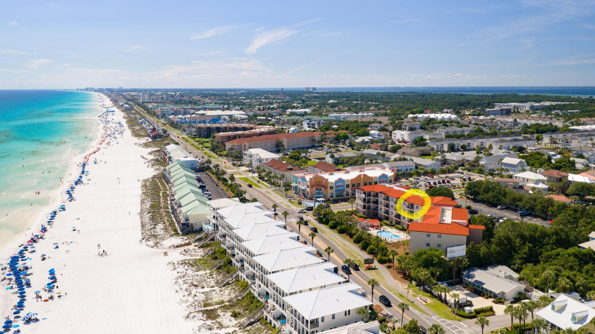 TOP FLOOR CORNER UNIT WITH GULF VIEWS, PRIVATE BEACH ACCESS & ONE OF THE BEST BALCONY LOCATIONS ON SCENIC GULF DRIVE! Rare top-floor, west-side CORNER UNIT offering privacy, partial Gulf views, and an unbeatable beachside lifestyle just steps from the sugar-white sand beaches of the Emerald Coast. Perfectly positioned within the complex, this 2-BEDROOM/2 BATH CONDO enjoys one of the BEST BALCONY LOCATIONS in the community, allowing for shaded afternoons during the hot summer months while still capturing warm winter sunlight and BEAUTIFUL GULF VIEWS throughout the cooler season. Located directly across from the PRIVATE GATED BEACH ACCESS, this condo makes beach days effortless for owners and guests alike. No long walks or crowded public parking lots -- simply grab your chairs and head to the beach within minutes. The TOP-FLOOR LOCATION also means no upstairs neighbors, creating a quieter and more peaceful coastal retreat with ABUNDANT NATURAL LIGHT throughout the condo. Inside, the large floor plan offers an OPEN-CONCEPT LIVING and dining area with partial Gulf views from the living room, dining area, kitchen, and balcony. The spacious covered balcony is ideal for morning coffee, evening relaxation, or simply enjoying the coastal breeze while OVERLOOKING SCENIC GULF DRIVE and the Gulf waters beyond. The condo has been well maintained and offers the opportunity to enjoy immediately or personalize over time to fit your own style and vision. This Scenic Gulf Drive location is.. especially appealing for those seeking a walkable beach lifestyle. Restaurants, entertainment, shopping, and beach stores are all within walking distance from the complex, making it easy to enjoy the area without constantly getting in the car. A convenient beach store located next door is perfect for forgotten beach gear, snacks, souvenirs, or last-minute essentials. Wide walking and biking paths along Scenic Gulf Drive create the perfect setting for morning walks, jogs, and bike rides along the coast.

Community amenities include gated beach access, a community pool, hot tub, grilling area, picnic tables, and ample parking. Located near golf courses, popular restaurants, shopping, and entertainment, this condo offers the perfect combination of privacy, beach convenience, walkability, and relaxed coastal living in one of Miramar Beach's most desirable locations.