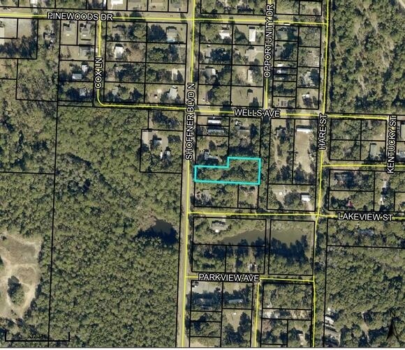 Huge lot with a 1981 2-bedroom 1 bathroom 840 sq ft mobile home given no value however could be possibly repaired via the right person. There is also a 2nd mobile home in the back given no value. There are two septic tanks and two meters on the property. Seller is motivated.