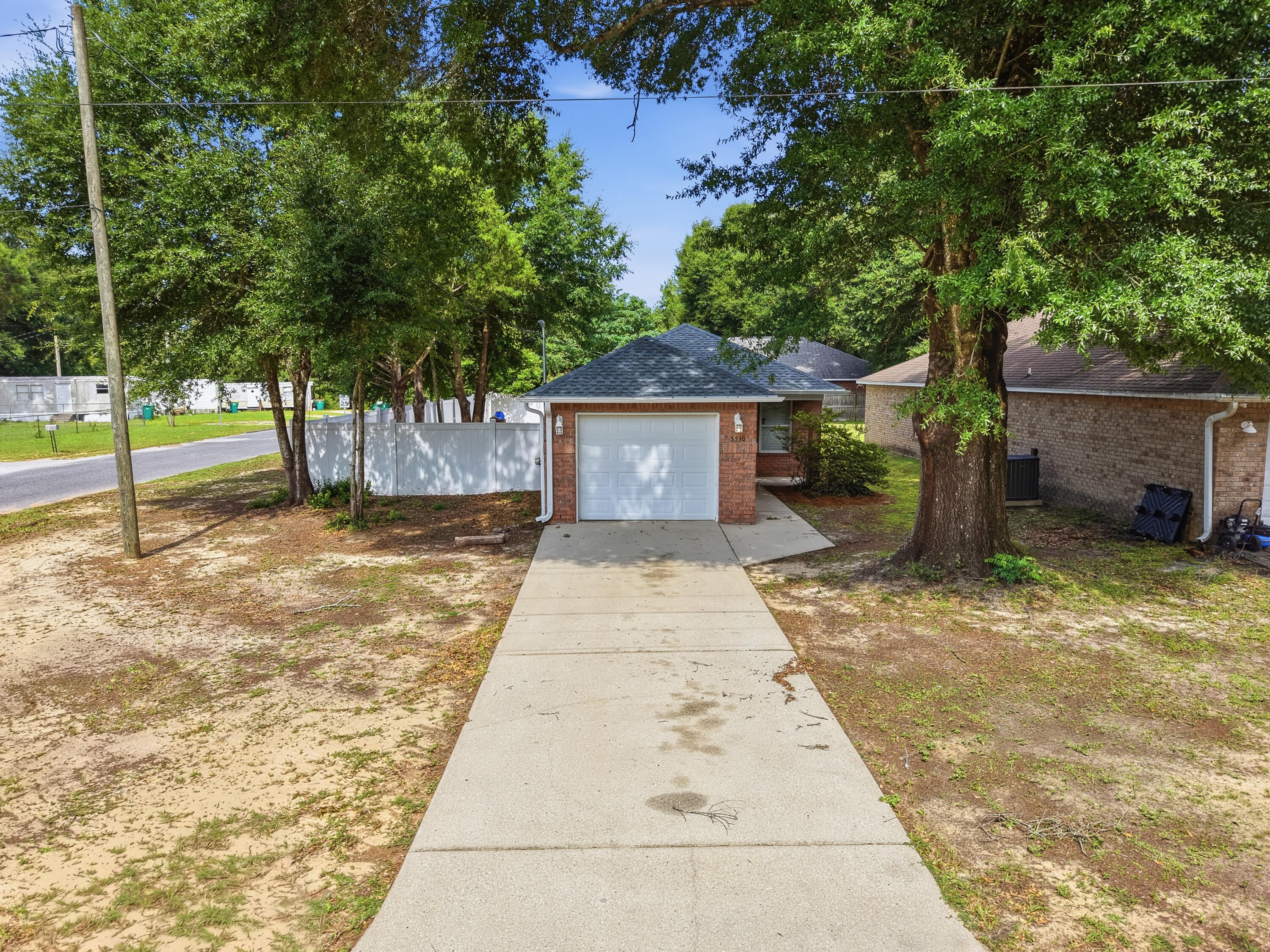 SELLER IS OFFERING $6000 TOWARDS BUYERS CLOSING COSTS.  Great starter home or investment opportunity situated on a large corner lot! This well-maintained property features a spacious kitchen with abundant cabinet storage, generous counter space, and a large pantry--perfect for everyday living and entertaining. The kitchen and living room boast durable vinyl plank flooring for a modern look and easy maintenance.
Step outside to enjoy the fully fenced backyard with attractive vinyl fencing, offering privacy and plenty of space for pets, play, or outdoor gatherings. A large workshop provides excellent space for hobbies, storage, or projects. Additional highlights include a new roof, adding value and peace of mind for years to come.
Don't miss this affordable home with great potential, ample outdoor space, and desirable updates!