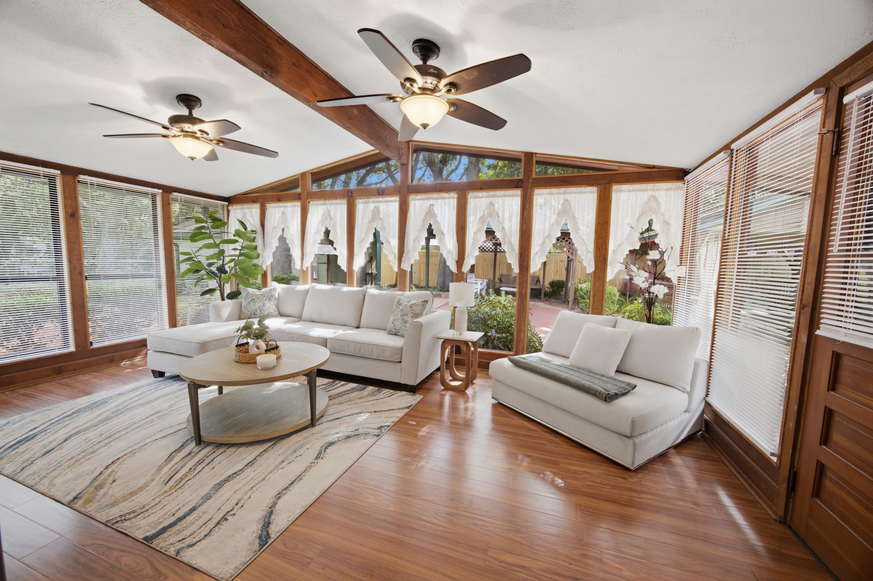 *RARE OPPORTUNITY* This home offers a solid foundation filled with unique character and room to personalize to your taste. Welcome to 503 Sheffield, a mid-century home built in 1959 that has been lovingly maintained by a single owner throughout its history. Step inside to find flexible living spaces for comfort and entertaining, featuring two distinct living rooms. The main living room provides a cozy retreat, while the secondary living room functions as a Florida room framed by full-height windows, warm exposed ceiling beams, and rich new Pergo waterproof flooring that bathes the home in natural light. Upgrades shine throughout with fresh interior paint (July 2026), modern updated outlets and switches across the entire home, and brand-new ceiling fans in both the primary bedroom and office. The kitchen highlights classic craftsmanship with solid wood cabinetry, built-in plate racks, lattice detailing, and a white gas range with a tile backsplash. Enjoy long-term peace of mind with major systems updated, including a roof warranty active through 2029 and a newly installed gas water heater (2026). Outdoor living and practical utility are evident throughout the property, which is outfitted with three carports, a shaded cabana, a spacious shed with electricity (perfect for a workshop or hobby space), and fresh exterior paint (July 2026). Fully fenced and meticulously maintained, with mature hardscape.