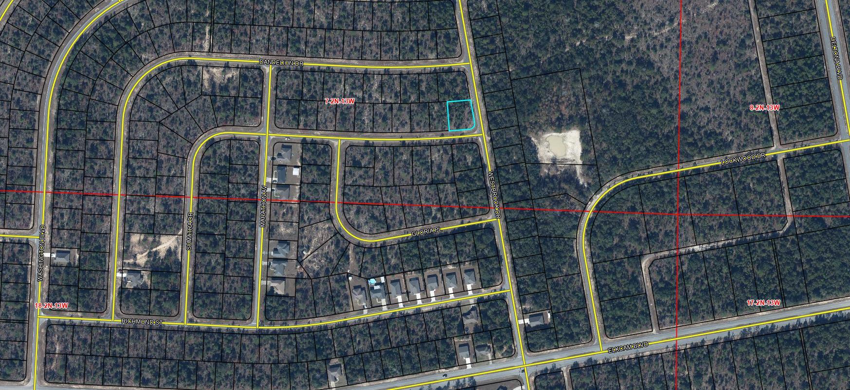 Discover the perfect setting for your future home on this .302-acre homesite in the growing community of Sunny Hills. With electricity located just nine lots away on the opposite side of the street, this property offers a great opportunity to build in an established area while enjoying the peace and natural beauty that make Sunny Hills so desirable.

Just a short distance away, you'll find one of the community's stunning spring-fed lakes, featuring crystal-clear water and white sandy beaches ideal for swimming, boating, fishing, and relaxing. Residents also enjoy access to the community's popular 18-hole golf course and clubhouse--all with no HOA fees.

Conveniently located, this property provides easy access to both recreation and everyday essentials. Panama City Beach, Pier Park, and Northwest Florida Beaches International Airport are approximately 45 minutes away, while shopping, dining, medical facilities, and other conveniences in Chipley are just 20 miles from the community.

Whether you're planning a primary residence, vacation getaway, or long-term investment, this lot offers an outstanding combination of value, location, and lifestyle. Need additional space? Two adjoining lots are also available, creating the opportunity for a larger homesite, added privacy, or nearly an acre of land to bring your vision to life. Well and Septic needed