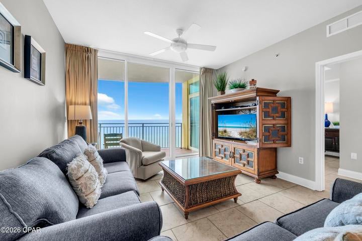 Experience premier Gulf-front living at Aqua Resort, one of Panama City Beach's most sought-after developments. Located on the 10th floor, this beautifully maintained 3-bedroom, 3-bath residence offers a rare and highly desirable floor plan featuring two Gulf-front master suites, each with private bath, stunning Gulf views, and direct access to the expansive bow-shaped balcony. With 1,594 square feet of living space, a spacious Gulf-front living area, and a versatile bonus space currently used as a game room, this residence offers exceptional space and functionality for a second home, vacation getaway, or investment property. One of the property's most impressive features is the large bow-shaped balcony, offering extraordinary panoramic views of the emerald waters and sugar-white beaches. With plenty of room to relax, dine, and entertain outdoors, the balcony provides the perfect setting for morning coffee, afternoon Gulf breezes, and unforgettable sunsets. The interior is meticulously maintained and offered fully furnished, making this a true turnkey opportunity. Both Gulf-front master suites offer private baths and balcony access, with the primary suite featuring a king bed and the second master suite featuring a queen bed. The third bedroom also features a queen bed and convenient access to a full bathroom. The well-appointed kitchen features granite countertops and stainless-steel appliances, while the breakfast nook and in-unit washer and dryer add everyday convenience.