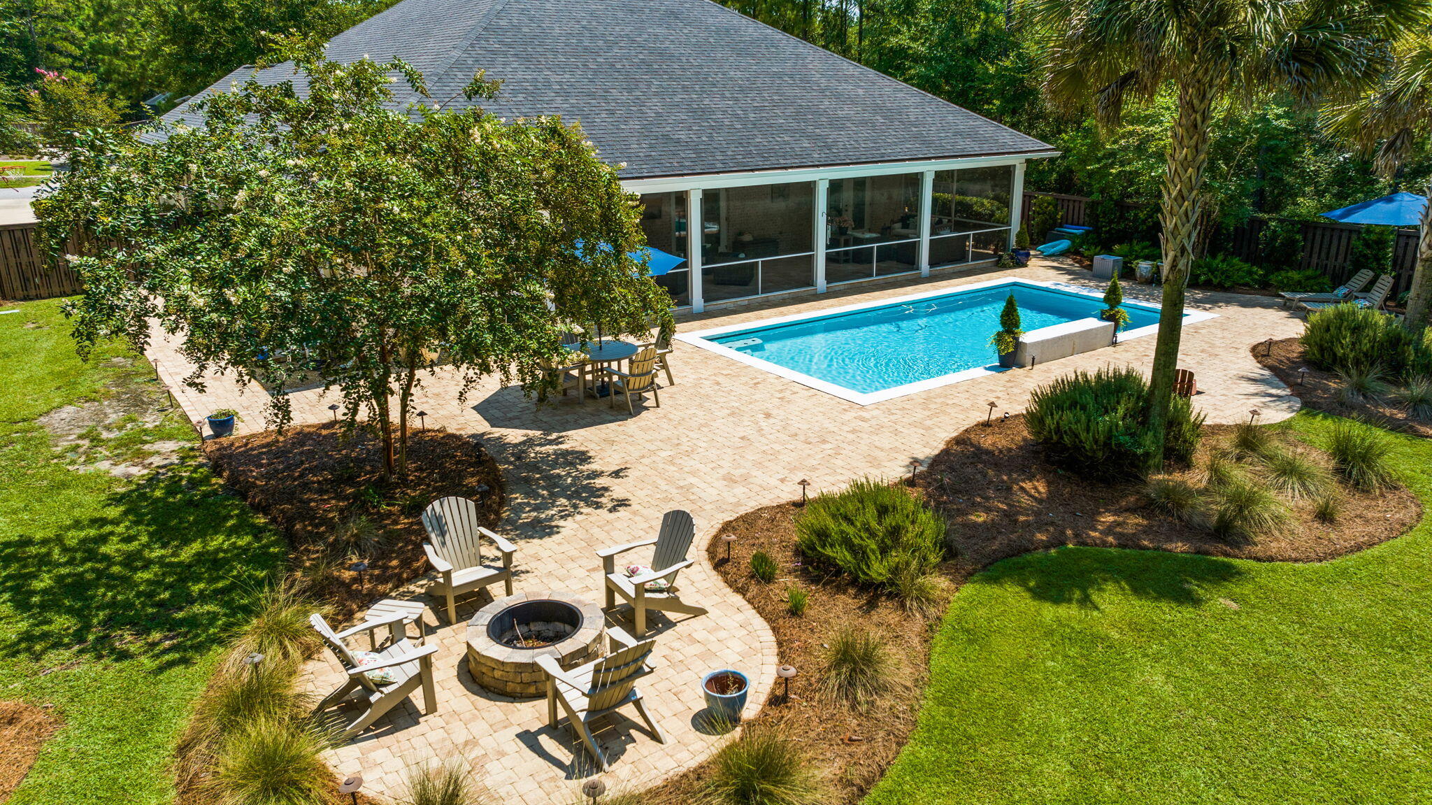 Positioned on one of the largest, most sought after 1/2 acre lots on the cul de sac in the Harmony neighborhood of Hammock Bay. This residence is a master class of custom craftsmanship and design. It encompasses 4 bedrooms, 3 baths and expansive living spaces that seamlessly connect. A wall of windows and French doors overlook the generous 15X60 outdoor screened lanai, pool and landscaped yard w/privacy fence. Every detail has been meticulously selected, from the designer finishes and custom interiors to the saltwater heated and cooled pool.  Several levels of outdoor living are designed to enjoy the peaceful view of the preserve. Perfect for entertaining family and friends or enjoying a quite moment alone. This home provides an exceptional lifestyle at every angle. One will greatly appreciate the many features offered.  This home is a must see.  Accompanied with the wonderful amenities Hammock Bay has to offer.  3 Clubhouses, Bayfront access, Pools, Fitness Ctrs, Sports Complex, General Store, Brewery and more. Additional special features are listed in the document section.  All dimensions are to be verified by buyer.