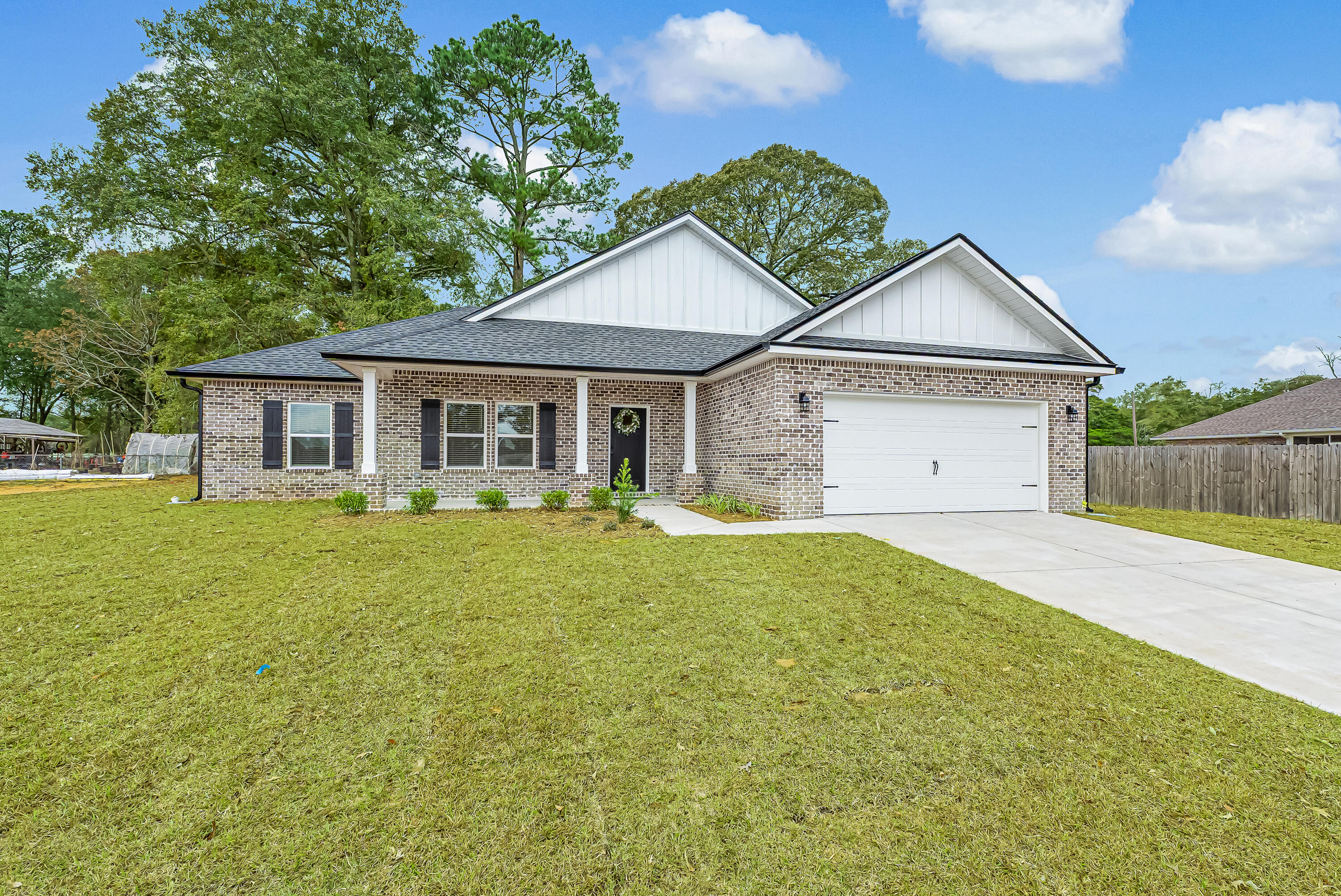 'SIERRA PLAN' - WITH UPGRADES Already included - Gutters, Refrigerator and blinds on all windows!  Ultra convenient BARTON'S BEND S/D, perfectly nestled off Airport Rd & Houston Lane. Fully landscaped yard w/sprinkler system, finished 2-car-garage, front and rear porch, luxury vinyl plank flooring throughout, mate black hardware.  Kitchen has quartz countertops, white shaker style cabinets, work island w/bar seating, cozy dining nook, all overlooking family gathering space.  Split BR plan.  Owner's bath has double vanities, tile shower, walk-in closet + linen storage, additional bath has double vanities & linen storage.  Mud room w/space for lockers, freezer and laundry room.  Seller will contribute up to $15,000 towards buyers closing costs/prepaids/rate buydown (call for details).  Must close by August 31, 2026.  COMPLETE AND READY TO MOVE IN!