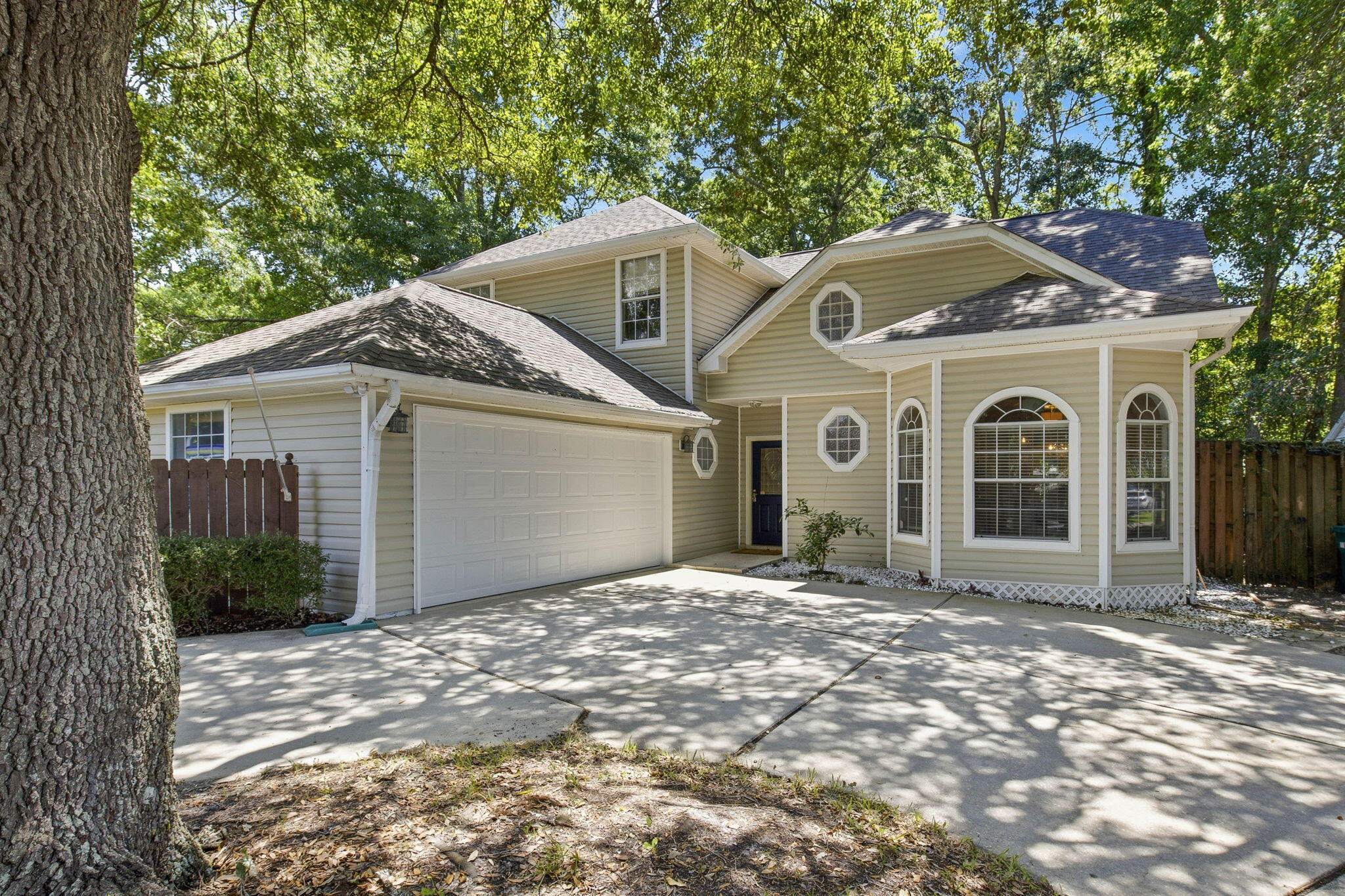 2026 Roof, Bay Access, & Boat Lift Available!

Back on market, no fault to seller!

Enjoy Gulf access with no flood insurance required! Situated on a quiet one street community in Mary Esther, this home sits in a neighborhood that comes with something most simply can't offer: a neighborhood dock with Bay access, boat slips available for rent by homeowners, and a community pool, just a short walk from your front door. Whether you're launching a kayak at sunrise or just watching the water at the end of the day, this is the kind of lifestyle most people vacation to find. The home itself is warm, spacious, and full of character. Soaring ceilings and fresh interior paint throughout give it an airy feel from the moment you walk in. The living room holds a classic fireplace, the kitchen features granite counters and a wine cooler, and the Florida room extends your living space into the outdoors year round. The primary suite includes his-and-hers closets, and two of the upstairs guest bedrooms offer bonus closet space -- perfect for extra storage or a fun hideaway for the kids. A dedicated office space rounds out the layout, giving you room to work from home without sacrificing a bedroom to do it. 

Out back, you'll find a large fenced yard with plenty of room to breathe. And the location? It's hard to beat. You're just minutes from Hurlburt Field, making the daily commute almost an afterthought. Navarre Beach and Okaloosa Island are both within easy reach, putting two of the Gulf Coast's most beloved stretches of sand practically at your doorstep. Add in the restaurants, Target, parks, and everyday conveniences all within a mile, and this address delivers a level of convenience that's genuinely rare to find.

Come see why life on Islandview feels right.