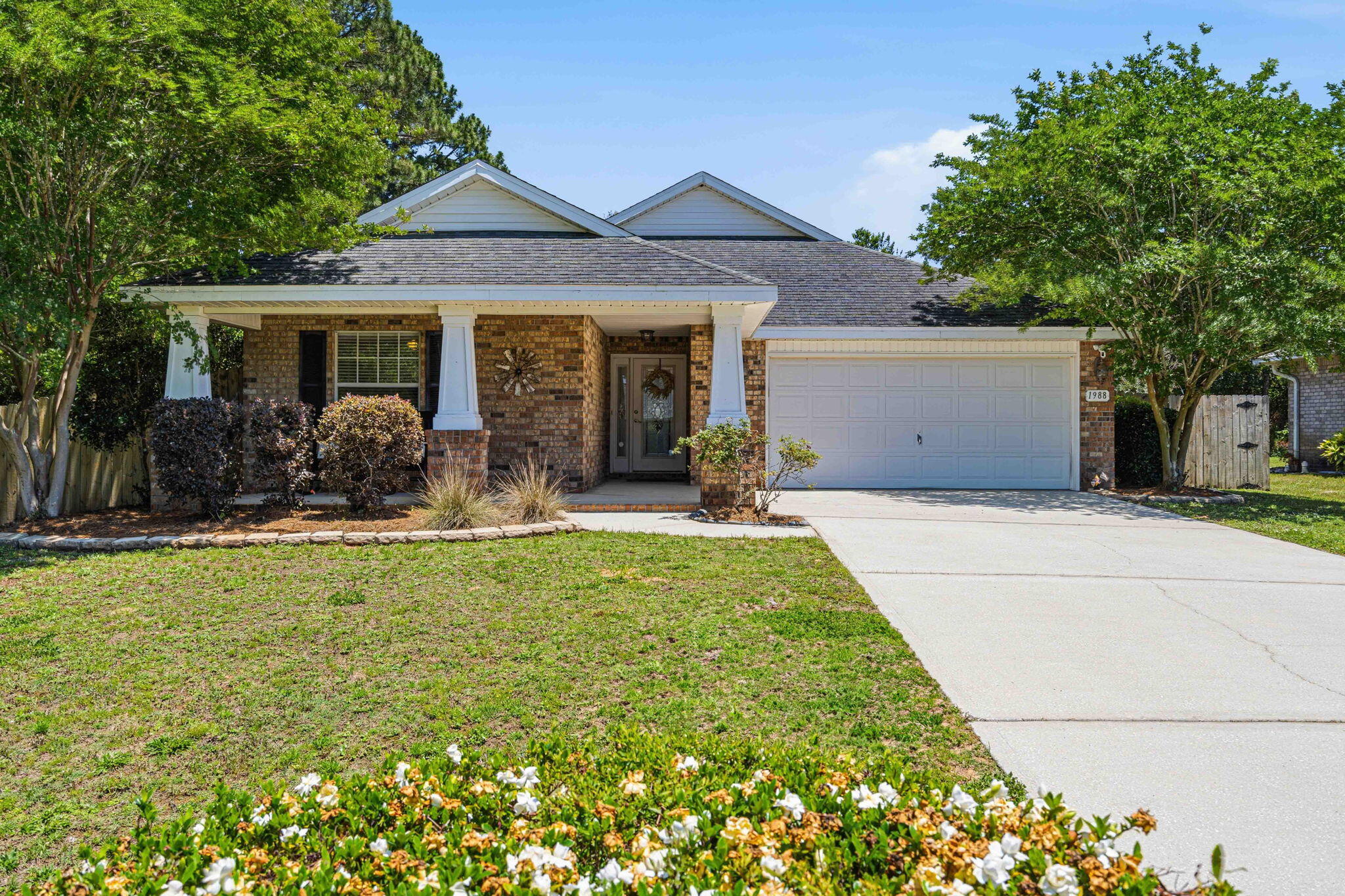 Tucked away on a dead end road in the desirable Holley By The Sea neighborhood, this 4 bedroom, 2.5 bath home offers privacy, functionality, and plenty of outdoor space to enjoy. Situated on a large fully fenced lot, the backyard is designed for relaxing and entertaining with a custom paver patio, fire pit area, chicken coop, and a screened back porch perfect for enjoying quiet mornings or evenings outdoors.

Inside, the split floor plan offers a functional layout with the primary suite separated from the additional bedrooms for added privacy. The kitchen opens seamlessly to the dining and living areas, creating an open-concept feel that works well for both everyday living and entertaining.

Owners also enjoy access to the Holley By The Sea amenities including pools, tennis courts, pickleball, fitness center, playgrounds, boat launch access, and more. Convenient to beaches, schools, shopping, and Hurlburt Field.

Sellers will replace roof prior to closing with acceptable offer. VA assumable option for VA buyers.