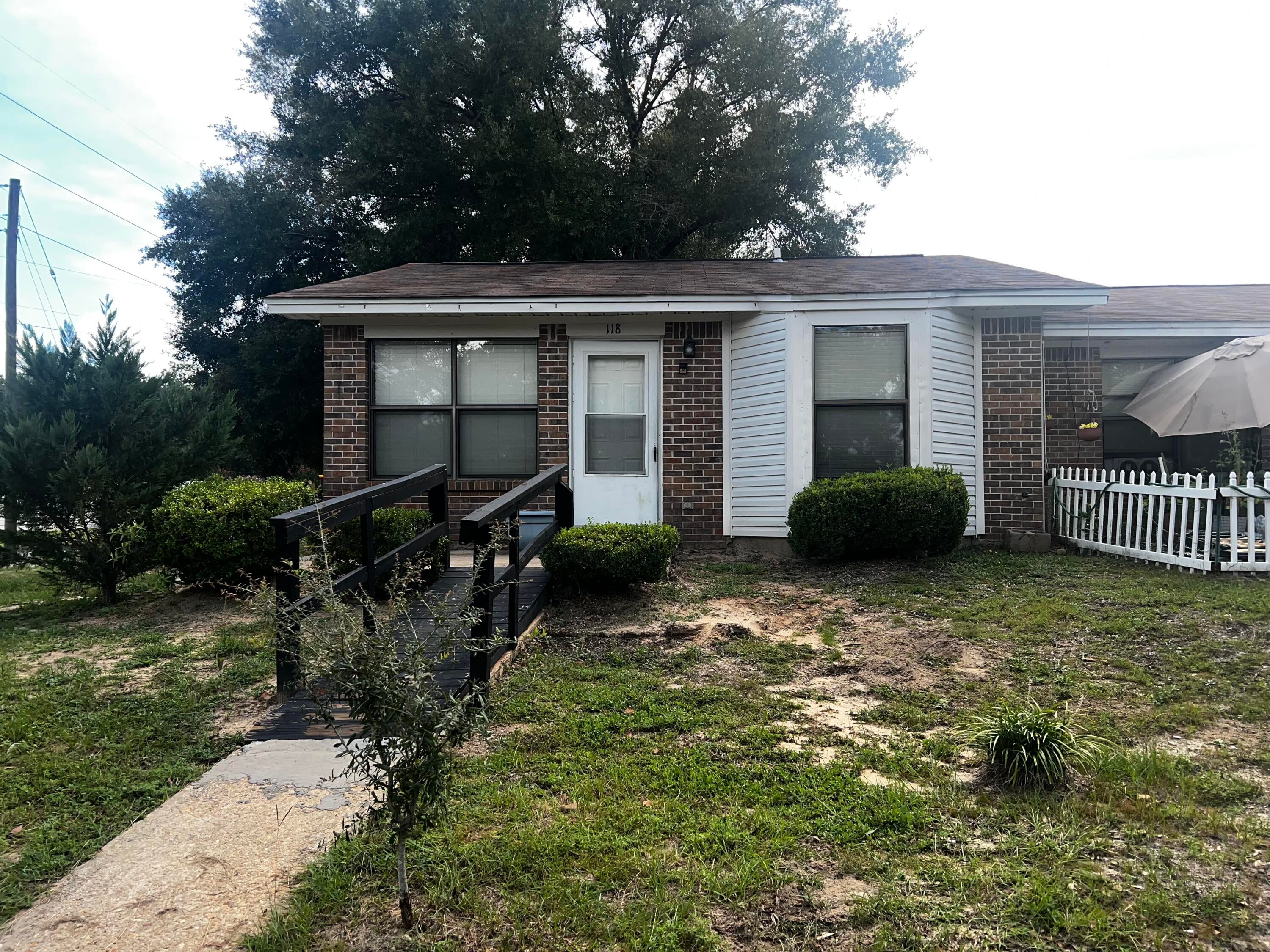 This is an end unit with an exterior storage closet. The house has been freshly painted and new flooring has been installed. No pets please.