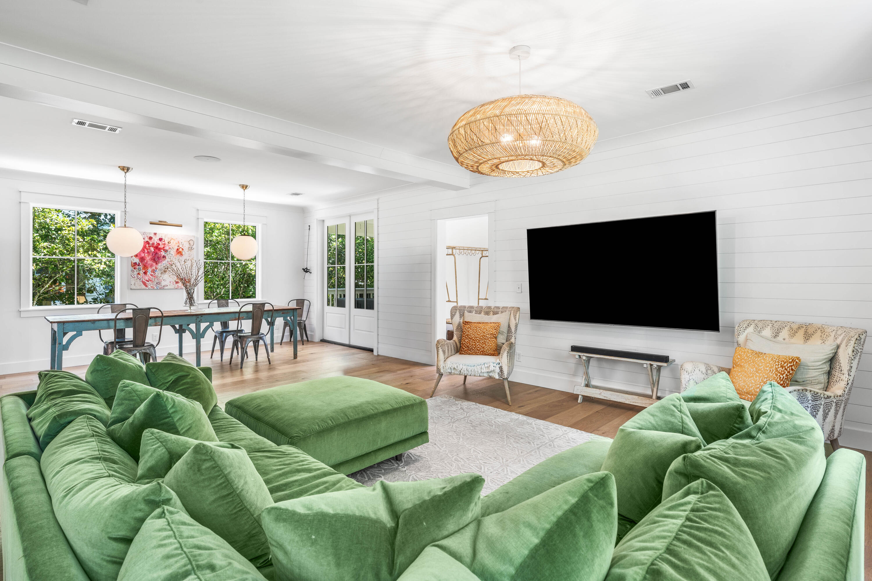 A remarkable opportunity awaits you! This meticulously renovated three-bedroom, three-and-a-half-bathroom residence, situated in the heart of Seagrove Beach, boasts 2,752 square feet of newly constructed space behind a timeless coastal exterior. Every surface and finish has been replaced, and the property's location is conveniently situated just steps away from both Eastern Lake and the beach.
The renovation encompassed every aspect of the home, including new siding, windows, millwork, and spray foam insulation throughout. Additionally, a new tankless water heater and HVAC system were installed. The floor plan has been expanded with an added living area or study currently serving as a music room, a new upstairs bathroom, and a full laundry room.
Interior finishes are designer curated throughout. 
The downstairs features white oak hardwood flooring, a custom metal stair railing, shiplap walls, marble countertops in kitchen and every bathroom, and custom cabinetry with designer hardware. All bathrooms have been rebuilt with Toto toilets, new vanities, and tile, and the powder room includes a Palmer sink. Lighting is predominantly Visual Comfort. The kitchen is equipped with an ILVE double oven and range, a Thermador paneled refrigerator and dishwasher, and a scullery provides additional cabinetry, cooling drawers, a wine fridge, and an ice maker. The laundry includes a full-sized stacked washer and dryer, additional cabinetry, and access to the back deck and fenced backyard The exterior has been reimagined with an updated metal roof in the front, new front and back decks, turf and stone hardscape in the backyard, new sod in the front yard, a new stone driveway, an outdoor shower, an irrigation system, and a gas grill line. The home was painted both inside and out as part of the renovation.
Ideally located near the neighborhood beach access, residents can easily reach the Gulf as well as the paddling and kayaking waters of Eastern Lake, one of South Walton's rare Coastal Dune lakes. All of the amenities, including shops and restaurants, are conveniently nearby, placing this fully rebuilt home within easy reach of everything 30A has to offer.