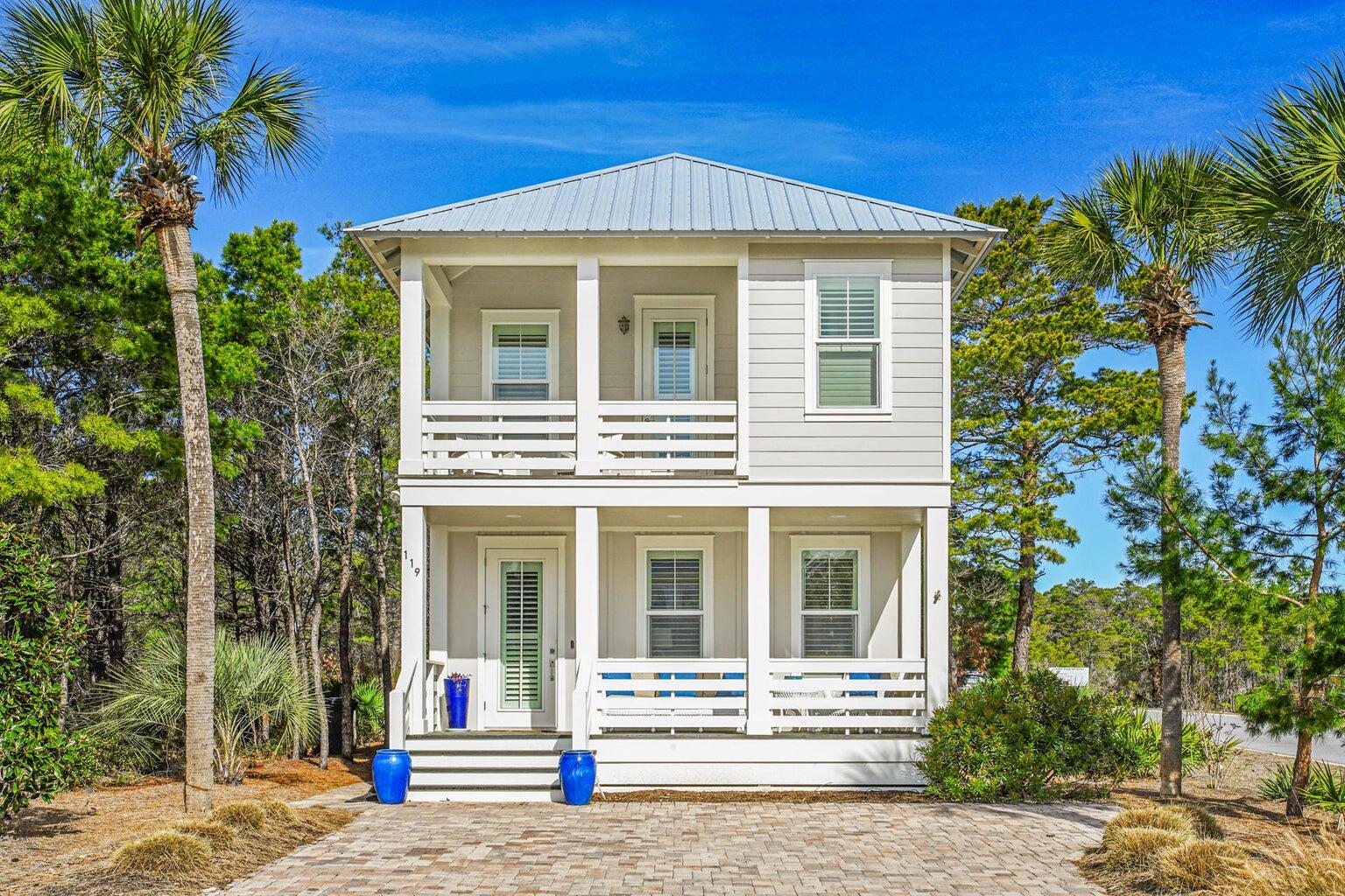Minutes to the Beach. This beach cottage sits on a corner lot with plenty of room for a back yard accent pool. It is being sold fully furnished and rental ready. Built in 2016 and meticulously maintained. The floor plan is open with modern coastal finishes and fresh upscale furniture. The main floor offers living, dining and kitchen as well as half bath, laundry and one master suite. The second floor offers another master suite with private porch along with 2 additional bedrooms and a shared bath. Special features include multiple porches, rear patio, a golf cart garage. The kitchen is ready to entertain with upscale counter tops and newer stainless steel appliances .
Shadow Pines is a charming neighborhood with lighted streets, private community pool.