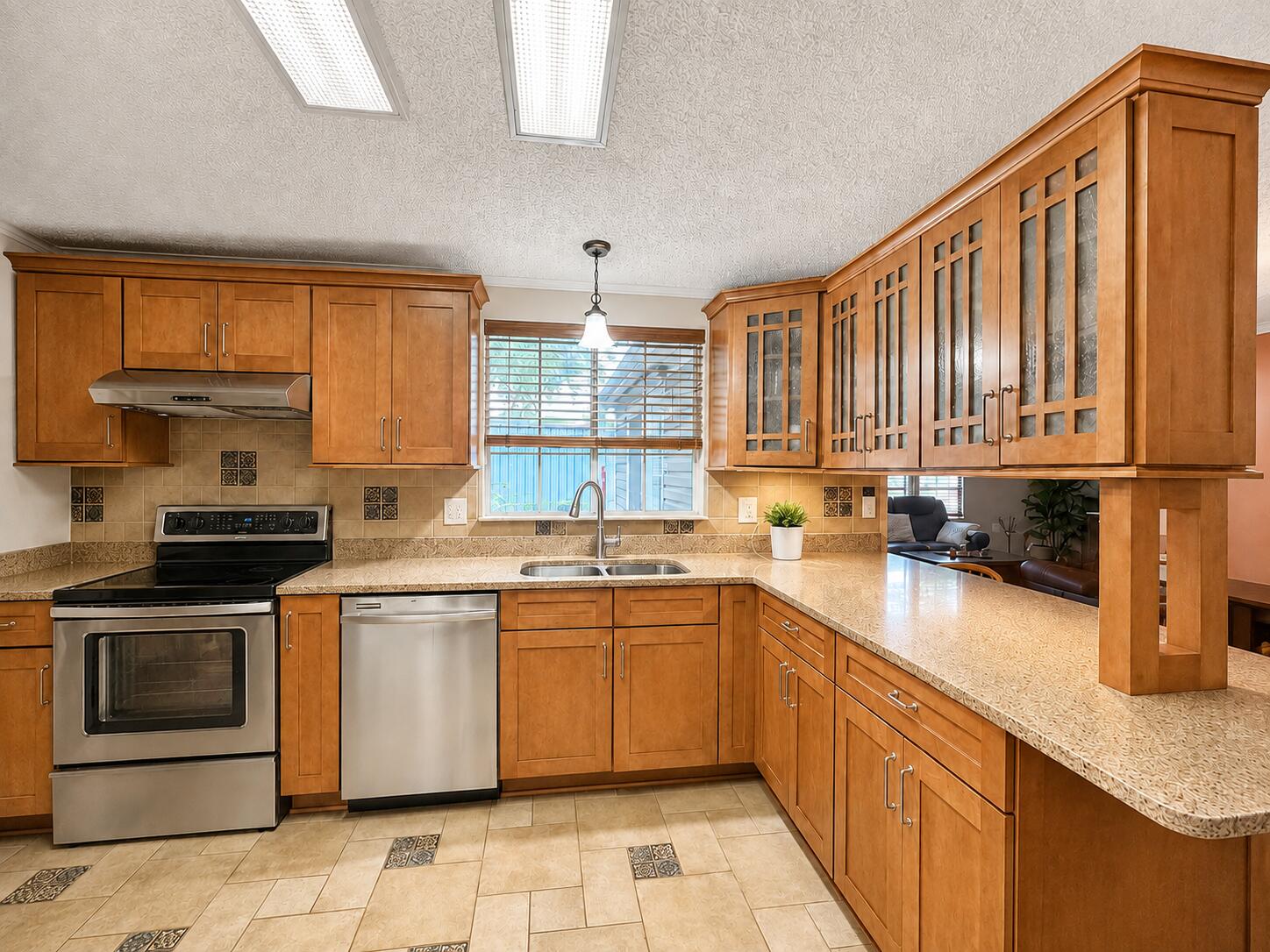 NO HOA! Discover this 3-bedroom, 2-bath home situated on approximately 0.56 acres in Freeport. The spacious kitchen features granite countertops, abundant wood cabinetry, stainless-steel appliances, a tile backsplash, and a convenient breakfast bar. Outside, mature trees, and a large covered porch create an inviting setting for relaxing and entertaining. The generous lot provides ample room for gardening, recreation, and outdoor enjoyment. With more than half an acre and no HOA, this property offers plenty of room to make it your own. Schedule your showing today!