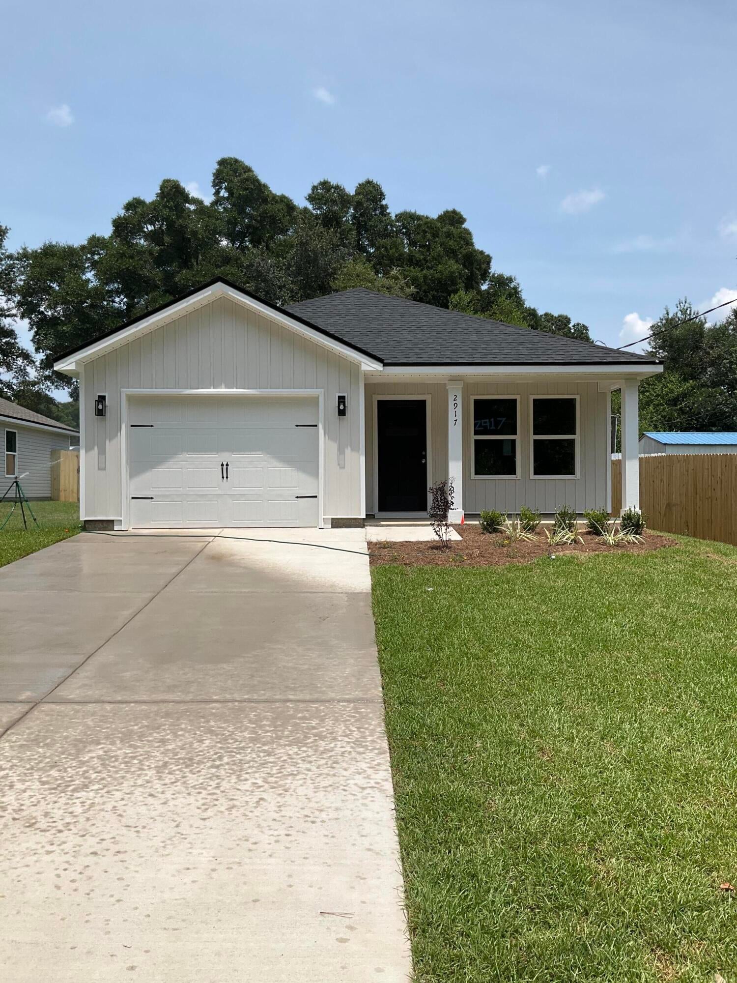 MID TOWN LOCATION AND READY NOW - $12,000 towards buyers closing costs (call for details).  ''Scarlet'' floor plan fits the budget, not too big and not too small.  Quartz work island w/bar seating in kitchen, large walk-in pantry, open family gathering space, owner's bath has walk-in closet, double vanities, shower only + linen storage.  Raised ceilings, vinyl plank flooring throughout, recessed lighting, ceiling fans in all bedrooms + family room.
Fully landscaped yard, front & rear porches for relaxing, finished 1-car-garage.  Photos of similar sold home, elevation will vary, interior/exterior colors & finishes will vary.  Call for more details.
