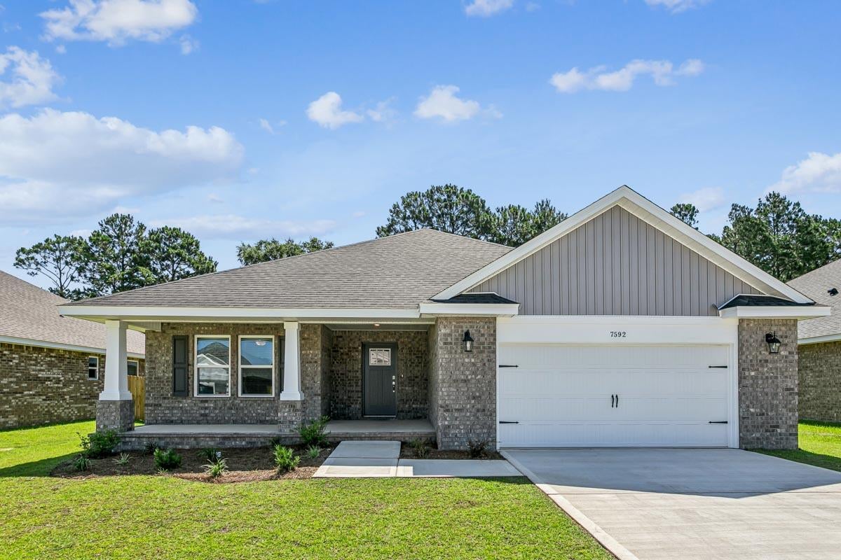 Welcome to the Ruby Floor Plan in Buckeyes Landing! This beautifully designed 4-bedroom, 3-bath new construction brick home sits on a .20 -acre lot in the Holley-Navarre community. The open layout features tray ceilings and a split floor plan, perfect for everyday living and entertaining. The gourmet kitchen includes stainless steel appliances, granite or quartz countertops, soft-close cabinets, under-cabinet lighting, bar seating, and a large pantry. The luxurious master suite offers double vanities, a garden tub, a fully tiled walk-in shower with dual shower heads, and two walk-in closets. Additional features include a whole-house blinds package, brushed nickel hardware, and quality finishes throughout. Buckeyes Landing is ideally situated in the heart of Navarre. The neighborhood is located off Bob Tolbert Road, providing convenient access to major routes including US-98 and State Road 87 for easy commuting east toward Destin or west toward Pensacola. Just minutes from local amenities - including shopping, restaurants, parks, highly rated schools, and world class beaches. Photos and 3D tour are of a similar Ruby floor plan and are for illustrative purposes only. Features, colors, finishes, and elevations may vary.
Projected completion is January 2027.