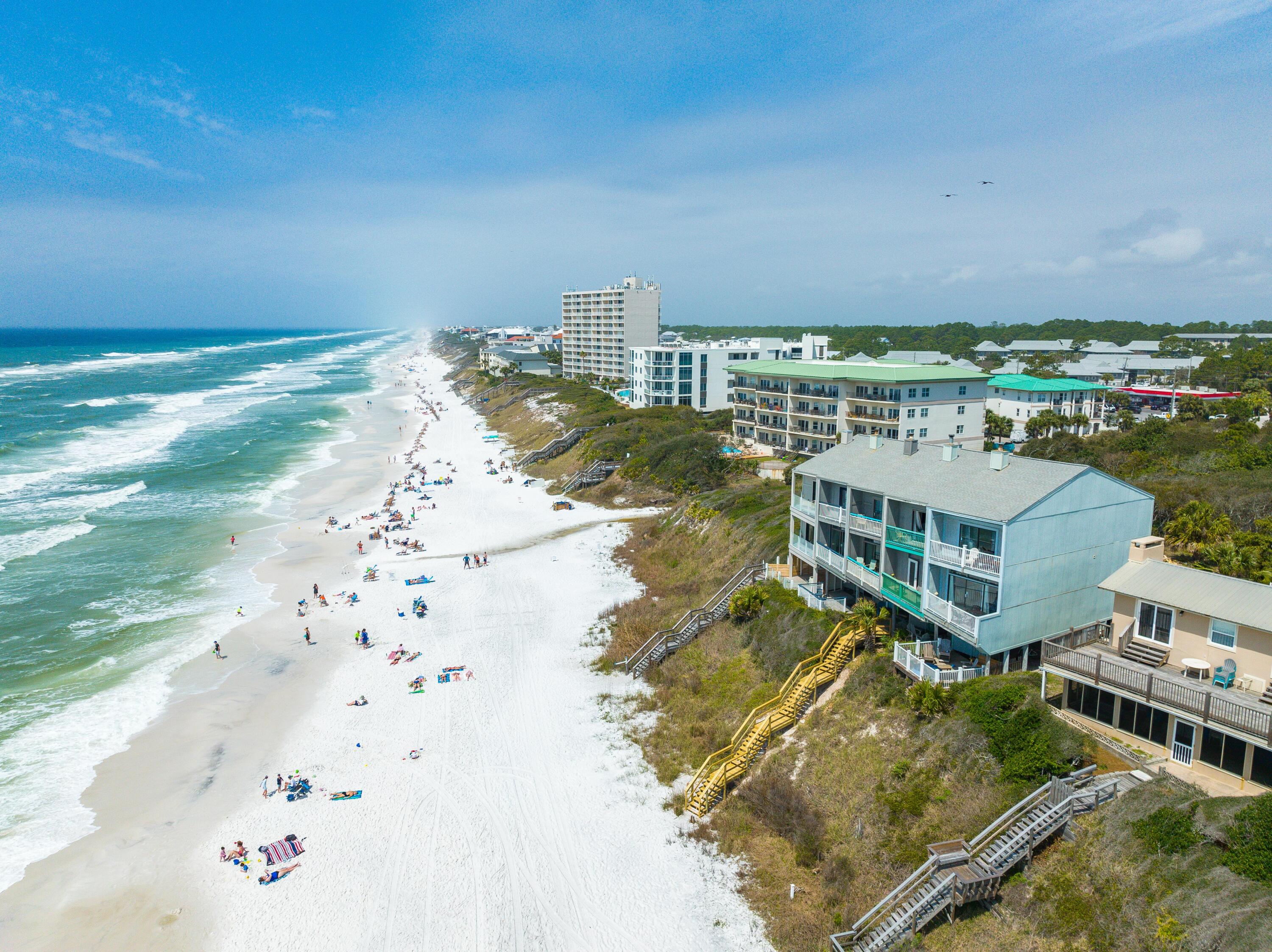 Direct access to the pristine white sandy beaches of scenic Hwy 30A.  Discover your dream coastal retreat in this  gulf front townhome. Offering breathtaking views from all three levels, the property features two spacious bedrooms, two and one half bathrooms and a recently updated kitchen with new cabinetry and stainless steel appliances. Located just one block south of  Hwy 30A, there is easy access to local shops, dining, entertainment, and the multipurpose path that extends for over eighteen miles along Hwy 30A.  Experience the perfect blend of comfort, style, and the serenity of coastal living. All dimensions and information are to be verified by the Buyer.
