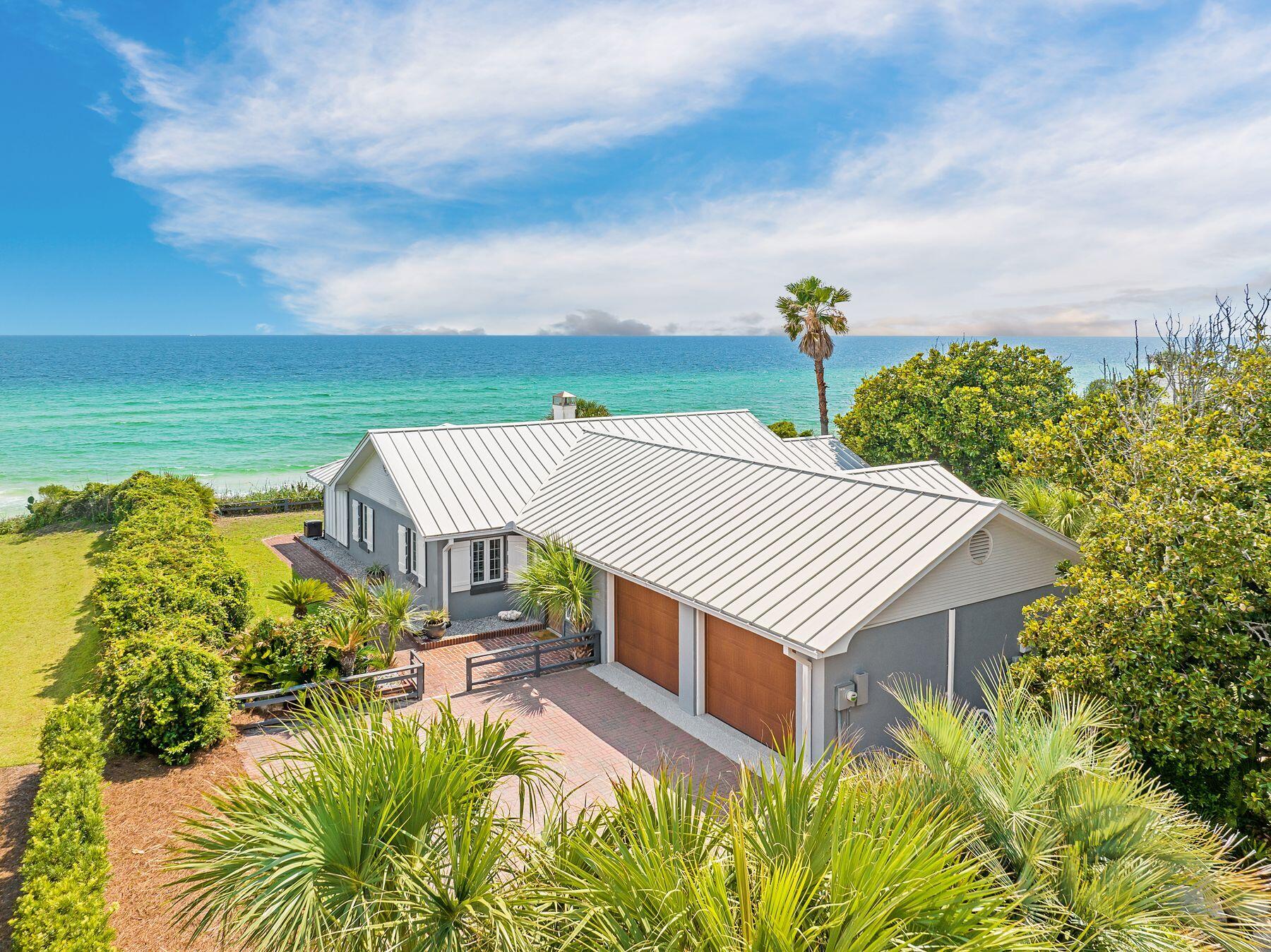 Tucked along one of the most iconic and tightly held stretches of Old Seagrove Beach, 58 Montgomery Street offers something increasingly rare on 30A. A Gulf front property with an impressive 90 feet of frontage on the Emerald Coast. This charming beach bungalow sits on a wide, private-feeling homesite with sweeping views and direct access to the sand. Whether preserved as is or reimagined down the line, the lot's generous proportions offer a level of breathing room that is hard to find this close to Seaside. Montgomery Street is home to just 15 Gulf front properties, each unique in architecture and character, and most held by longtime owners. It is a street where legacy and location matter more than flash, a quiet and coveted lane where properties rarely change hands. The existing home is single-level with 3 bedrooms and 3 bathrooms, comfortably laid out with multiple living areas, a screened porch, and one of the most peaceful sunset backdrops anywhere on 30A.
