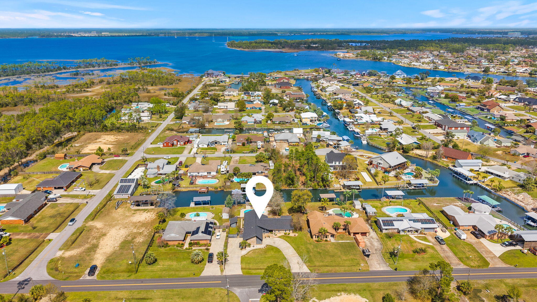 New Price. New Opportunity. - Significant Price Improvement - This waterfront home has been strategically repositioned to reflect today's market and now represents one of the best waterfront values available.
There's something about the water!
 One level. One Owner. Built to be lived in and loved for generations. This WATERFRONT OPPORTUNITY now offers a brighter, more inviting feel. Relaxed coastal culture with a private pool, canal frontage, and a covered dock--perfect for fishing, boating, and unwinding by the water. Pack your picnic and head over to Shell Island. The residence features 4 bedrooms and 2.5 baths, including a flex room conveniently located just inside the entry from the drive-through garage, opening on both sides to create a porte-cochère style arrival and exit. No HOA
This NorthShore waterfront home is ready for its next chapter and offers an exceptional opportunity along the Emerald Coast. Top Features | Property Highlights
- Hidden panel Bosch dishwasher seamlessly integrated into the island for a sleek look and ultra-quiet performance
- Premium JennAir cooktop
- Brand new, never-used Samsung double-door microwave/convection oven
- Samsung refrigerator in like-new condition
- High-efficiency HVAC system
- New drywall with double insulation Top Features | Property Highlights
- Hidden panel Bosch dishwasher seamlessly integrated into the island for a sleek look and ultra-quiet performance
- Premium JennAir cooktop
- Brand new, never-used Samsung double-door microwave/convection oven
 - Samsung refrigerator in like-new condition
- High-efficiency HVAC system
- New drywall with double insulation
