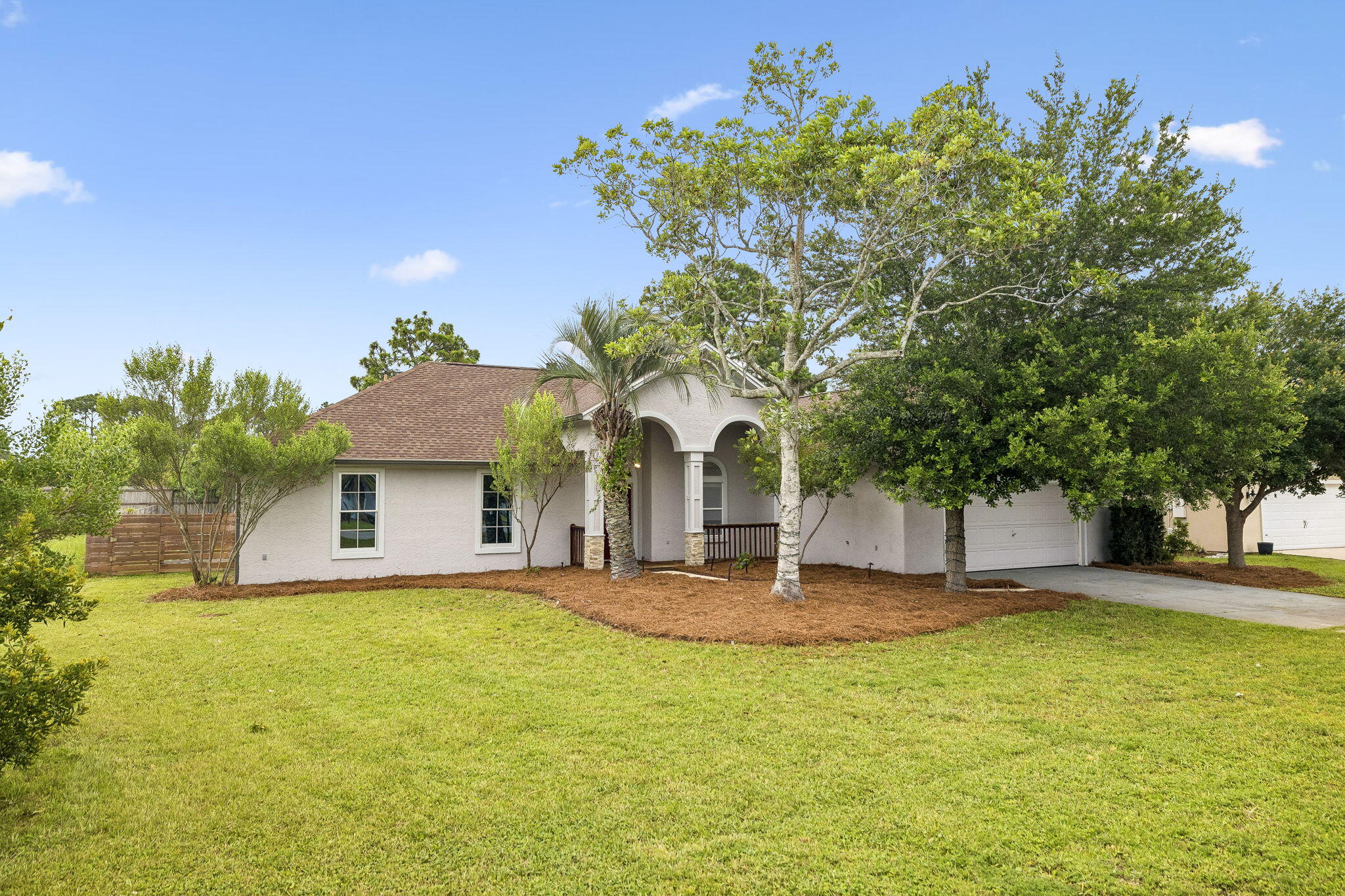 Move in ready! Designed with both comfort and functionality in mind, this home features a spacious and versatile floor plan with four bedrooms, a dedicated office, and a bright Florida room overlooking the sparkling pool. Arched entryways, soaring ceilings, and tile flooring throughout the main living areas create an inviting sense of openness and flow. 
The thoughtfully designed layout offers generous living and entertaining spaces, while the attached garage and expansive yard provide plenty of room for storage, recreation, and everyday convenience.