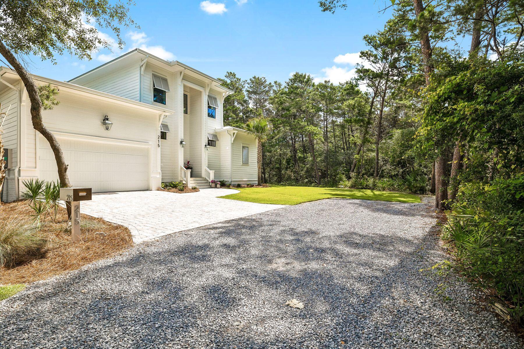 Nestled on a quiet dead-end street and bordered by protected land to the east, this thoughtfully designed custom home offers the perfect blend of luxury, comfort, and functionality. Built in 2024 by Matt Lollie, the home features soaring 12-foot ceilings and an open, airy main floor designed for effortless gathering and entertaining.

Currently enjoyed as a primary residence, the property also offers strong investment potential. A previously approved site plan included the option for a 20' x 12' pool, providing future owners with added flexibility and opportunity.

At the heart of the home, a commercial-style KitchenAid range anchors the chef's kitchen, complemented by an oversized walk-in pantry and generous gathering spaces. The living area flows seamlessly onto a spacious screened porch, creating the perfect setting to enjoy the coastal lifestyle year-round.

Designed with both functionality and privacy in mind, the first floor features a well-appointed primary suite and guest bedroom positioned on opposite sides of the home. Upstairs, two additional bedrooms provide comfortable accommodations for family and guests.

Ideally located within walking distance of public beach access, this home also offers easy access to some of the area's favorite restaurants, shops, and entertainment. Enjoy a quick bike ride or golf cart ride to Shunk Gulley, Goatfeathers, and nearby conveniences while still enjoying the privacy of a quiet, tucked-away setting. Combining quality construction, thoughtful design, and an exceptional location, this is a rare opportunity to own a custom-built home just moments from the Gulf.