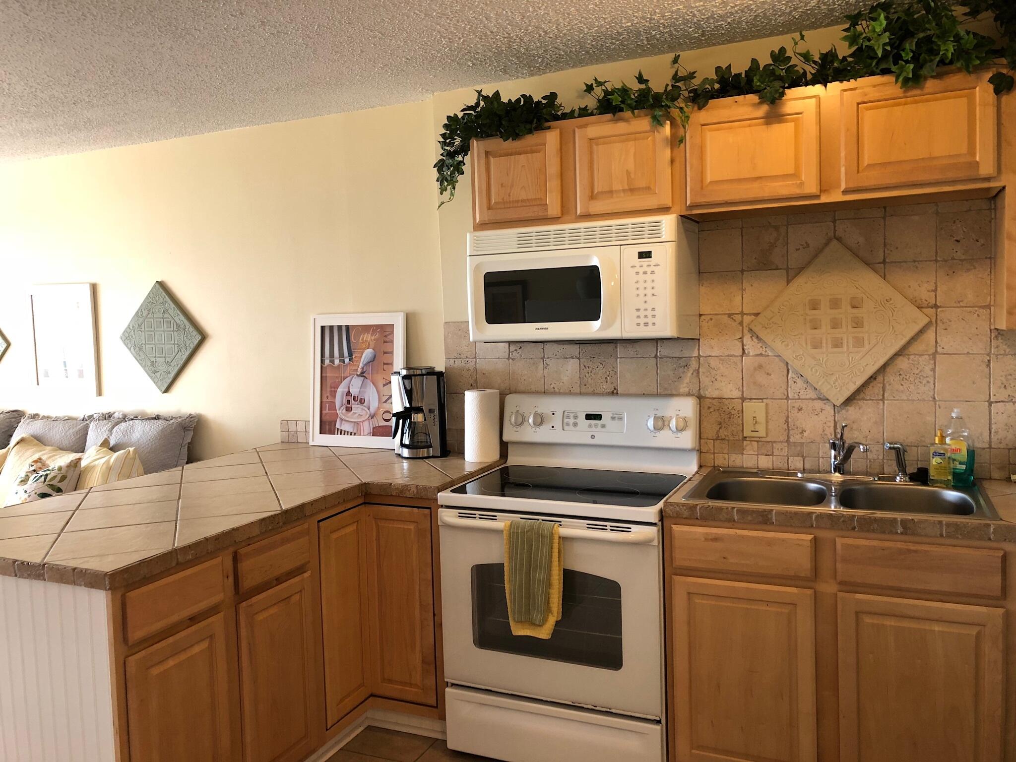 Bayfront Beauty! Stunning views from this fully furnished efficiency/1BA condo at Bay Villas. As you walk into this condo, you are greeted with a serene view of the Bay. There's a complete kitchen and washer and dryer in the condo. Utilities are included. Call now to see this immaculate condo.