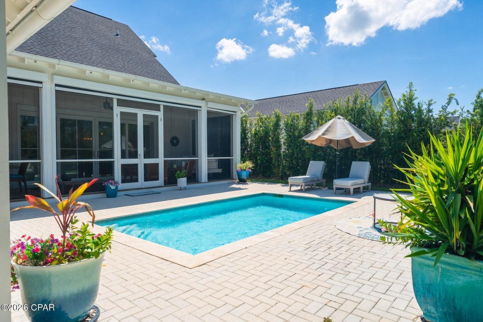 Welcome to 240 Log Landing Street, a beautifully appointed 4-bedroom, 4.5-bath home offering over 3,100 square feet of thoughtfully designed living space in the highly sought-after Watersound Origins community. With beautiful finishes, spacious living areas, and a private heated pool, this home offers the perfect blend of comfort, luxury, and coastal living. Designed for both everyday living and entertaining, 240 Log Landing features a stunning kitchen with Thermador and Bosch appliances, a generous 10-foot island, custom lighting, and an inviting open floor plan. A versatile second-floor bonus room provides additional space for a home office, media room, or second living area. Outside, the extended screened patio, electric hurricane shades, and private heated pool create a wonderful setting for relaxing or entertaining year-round. What truly sets this property apart is its location within Watersound Origins, a community known for its beautiful natural surroundings, welcoming atmosphere, and exceptional amenities. Residents enjoy walking and biking trails, a resort-style pool, fitness center, golf, tennis, pickleball, and neighborhood events that create a genuine sense of community. One of the greatest advantages of Watersound Origins is enjoying everything that makes 30A so special while maintaining a little distance from its busiest areas. Just minutes away are the sugar-white beaches of the Gulf, charming communities of Rosemary Beach and Alys Beach, incredible restaurants, boutique shopping, farmers markets, and endless opportunities for outdoor recreation. Whether it's a beach day, dinner along 30A, or an afternoon exploring the coastal communities, the best of the Emerald Coast is always close to home. Watersound Town Center offers the convenience of Publix, shopping, and dining right around the corner. The area also provides access to public and private school options, nearby Watersound Club amenities through separate membership, and convenient travel through Northwest Florida Beaches International Airport. 240 Log Landing Street offers something truly special: the excitement and beauty of 30A paired with the peace, privacy, and sense of community that make Watersound Origins such a wonderful place to call home. Call your agent and see this one TODAY! Measurements are approximate and should be verified by Buyer.