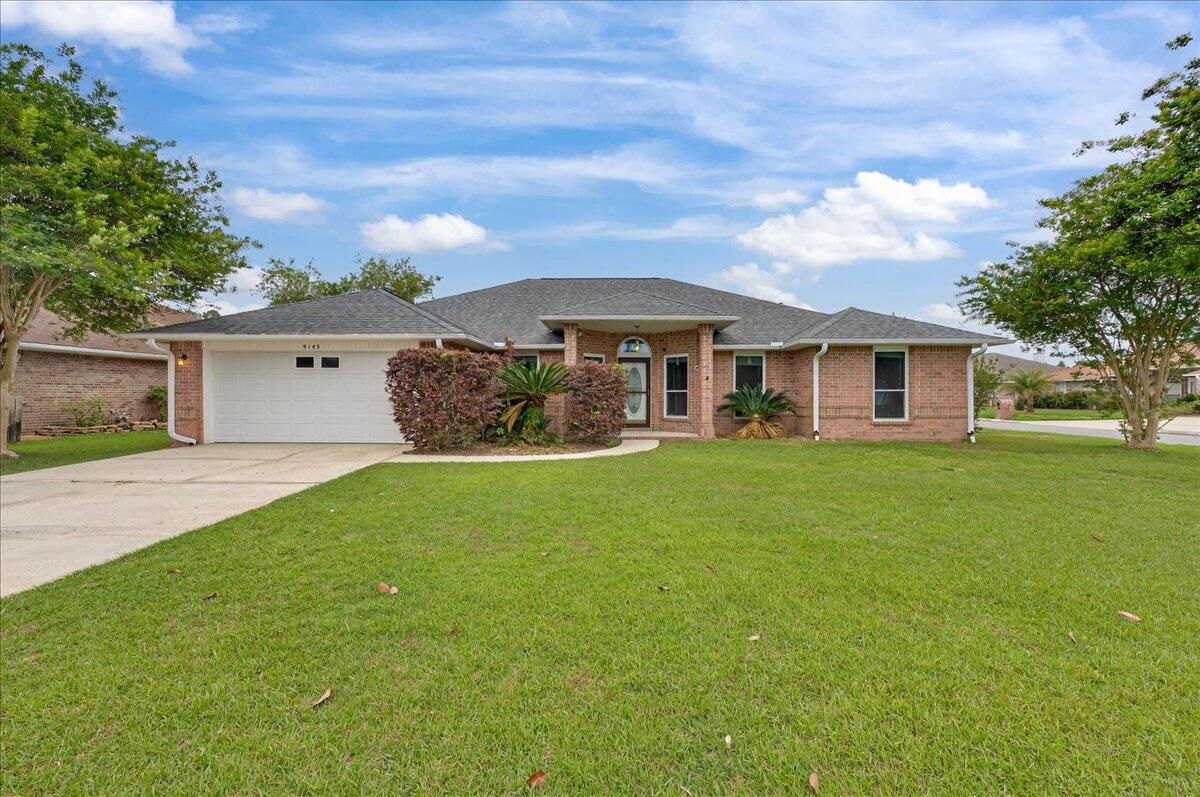 Welcome to this spacious four-bed, three-bath home with a bonus room! FRESH PAINT AND NEW LVP THROUGHOUT! NO carpet in this home. Situated in a clean, HOA-managed neighborhood with streetlights, this property offers a central Pensacola location. With a 2021 roof, 2019 water heater, and the windows replaced in 2017, the home is ready for its next owner! Inside, you'll find a large living room featuring high ceilings and a cozy gas fireplace. The kitchen is generously sized with white cabinetry, stainless steel appliances, a large island, and a breakfast nook for casual dining. The formal dining room provides a dedicated space for hosting, while the bonus room offers flexibility for a home office, playroom, or additional living area. The split primary suite offers privacy and includes a spacious en suite bathroom with double vanities, two closets, a soaking tub, and a separate shower. Additional bedrooms are thoughtfully positioned in their own corners of the home, each with access to bathrooms featuring tub/shower combinations. Step outside to enjoy the covered patio and fully fenced backyard, complete with a large 11'4' x 15'4' workshop/shed. A two-car garage and corrugated metal hurricane shutters adds even more convenience. Located just minutes from NAS Pensacola, Corry Station, and approximately 15-20 minutes from the beautiful beaches of Perdido Key, this home is also close to schools, grocery stores, restaurants, hospitals, and shopping. Ideally located near the intersec tion of Lillian Highway and Blue Angel Parkway, enjoy nearby outdoor recreation with Big Lagoon State Park, Navy Point Park, and Blue Angel Park all within a short drive. With its spacious floor plan, desirable neighborhood, and prime location, this home is an exceptional opportunity in Pensacola!