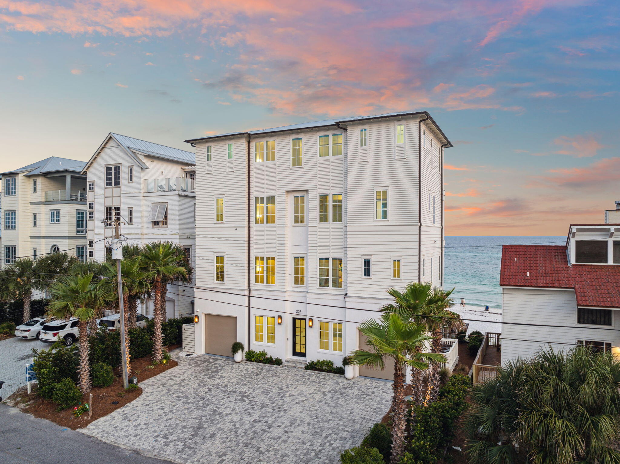 Perched on 65 feet of pristine Gulf frontage and just a short stroll to Rosemary Beach, this custom-built architectural masterpiece delivers the ultimate coastal lifestyle along 30A. Designed by Brian Stackable and crafted with exceptional attention to detail, this legacy Gulf-front home offers an unmatched combination of luxury, comfort, and timeless design.

Spanning over 5,200 square feet across four levels, the home features 6 bedrooms, each with its own ensuite bath, and an elevator servicing all floors. The first floor is solid concrete, providing structural integrity and peace of mind, while opening to a spacious living area with a kitchenette perfectly positioned off the private pool. Inside, floor-to-ceiling Eurowall sliding doors showcase breathtaking panoramic Gulf views from every room, creating a seamless connection between indoor and outdoor living. The open-concept main level boasts a chef's kitchen with Wolf, Sub-Zero, and Cove appliances, an oversized island, walk-in pantry, and custom cabinetry designed for both entertaining and everyday living.

The primary suite is a serene retreat, featuring two large custom closets, a washer and dryer conveniently located within the suite, and a spa-inspired bath. Beverage coolers, powered window treatments, and premium finishes are thoughtfully integrated throughout the home.

Step outside to your private beach walkover and enjoy a backyard oasis complete with Ipe decking, a heated pool with spa jets, turfed lounge areas, and shellstone pavers that complement the coastal landscape. The two-car garage includes heated and cooled storage, with a side-access design that provides easy entry for beach gear and pool essentials.

Never rented and maintained in pristine, like-new condition, this home stands apart as a rare Gulf-front offering. With ample parking, luxury finishes at every turn, and Gulf views that stretch endlessly across the horizon, 323 Pompano Street isn't just a home it's a rare opportunity to own a generational retreat on one of 30A's most coveted stretches of sand.