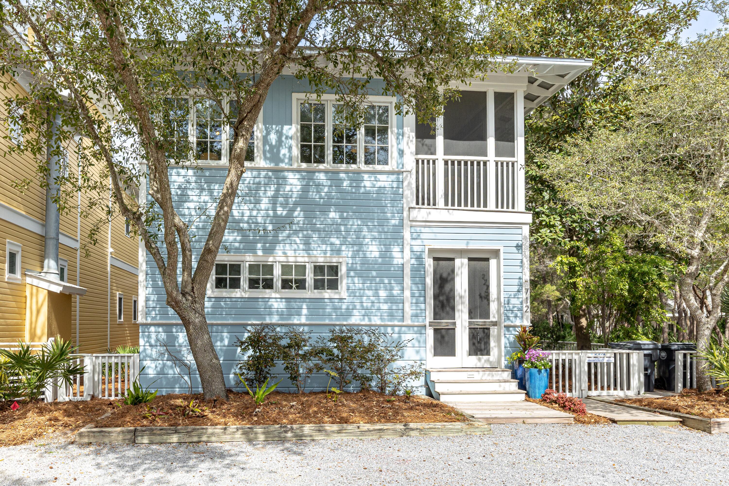 Charming 4 bedroom Charleston-Style Home in Seaside, Florida. Nestled among the lush natural landscape of Seaside, this elegant
home combines classic Southern charm with modern coastal living. Featuring 4 bedrooms and 3½ baths, this thoughtfully designed residence offers multiple outdoor living spaces and an airy, light-filled interior.
A pair of welcoming side porches on both the first and second levels overlook a serene wooded lot, creating a peaceful retreat just moments from all Seaside amenities. On the first floor, discover a spacious master suite with private bath, along with two guest bedrooms that share a well-appointed full bath. The second floor serves as the heart of the home--a bright, open-concept living area where the vaulted ceiling, casement windows, and French doors  connection between indoor and outdoor spaces. The living, dining, and kitchen areas, along with a half bath and a second master suite with a private bath, provide both comfort and flexibility for entertaining or hosting guests.
Step out onto the screened porches through French doors and enjoy coastal breezes, morning coffee, or evening relaxation surrounded by nature. Flooded with natural light and designed for an effortless flow between rooms and outdoor living, this home embodies the very best of Seaside's relaxed elegance.