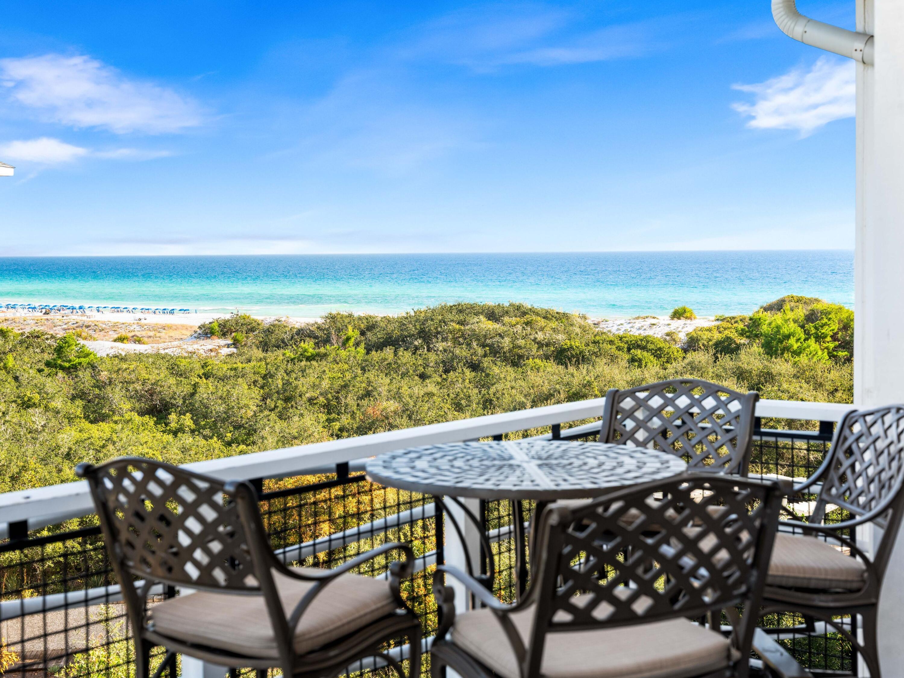 Discover a rare opportunity in WaterSound Beach with this top floor Compass Point residence comprised of two bedrooms and two full baths. This condo offers breathtaking southeast Gulf and dune views from the spacious corner balcony.  
This well-maintained condo offers a comfortable and functional layout. The open kitchen, living and dining spaces are bright and inviting with raised ceilings and a multitude of windows. The expansive balcony provides a perfect spot to unwind and soak in the beach views and breeze. The updated kitchen features stainless appliances and ample counter and cabinet space. 
The primary suite serves as a peaceful retreat with picturesque views from the windows, private balcony access and an updated ensuite bathroom with double vanity and walk-in shower. The spacious guest bedroom includes two queen beds and an updated ensuite bath with shower and double vanity.

The top-floor residences in Compass Point rarely come to market which makes this a very special opportunity.

The property conveys with a dedicated parking space, storage unit and golf cart parking area. Community amenities include multiple pools including one exclusive to  Compass Point condo owners.  Multiple parks, green spaces, a fitness center, and one mile of coastline with spectacular white sand dunes make this one of the most special neighborhoods along Highway 30A.