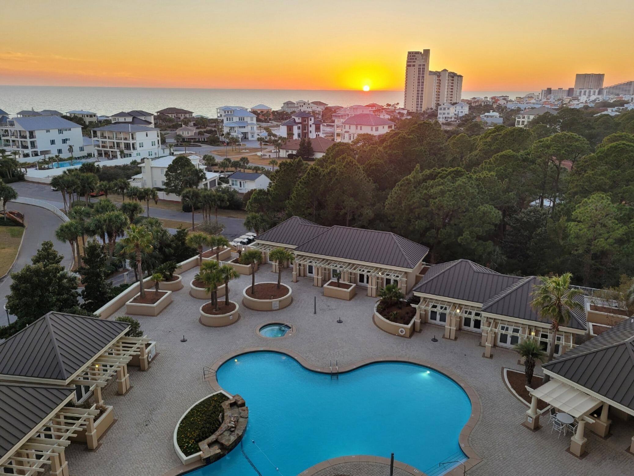 Now priced to reflect current market trends, this offering presents a rare opportunity to secure the largest condo in One Beach Club with substantial built-in equity. Spanning over 4,130 square feet on a single level, this residence was created by combining two units at new construction, resulting in a uniquely expansive floor plan rarely available within Sandestin's premier private, non-rental building.

With more than 850 square feet of terrace space across four balconies, the home captures sweeping Gulf and Bay views from every living space and bedroom. The open living and dining area provides over 900 square feet of entertaining space with direct Gulf views and balcony access. The private primary suite lives as its own wing, featuring a hallway privacy door, Gulf and Bay view balconies, dual walk-in closets (one exceeding 100 square feet), dual vanities, separate lavatories, and a secondary private entry.

A large flex room (previously used as an art studio and office) functions as a bedroom and exceeds the size of many primary suites, also enjoying Gulf views and balcony access. The space offers ample room to incorporate an ensuite bath, creating an additional full bedroom suite. A dedicated office with built-in shelving overlooks the Bay and presents a clear opportunity to be converted into a fifth bedroom, further enhancing the overall functionality of the floor plan.

Immaculately maintained by its original and only owner, the residence is fully functional and comfortable as-is, while also offering a compelling path to further elevate both form and function. With multiple areas already lending themselves to reconfiguration -- including space for an additional ensuite bath, conversion of the office to a bedroom, and the ability to enhance the existing powder room with a full shower -- the layout supports a potential transformation to a five-bedroom, five full-bath residence. This flexibility allows a buyer to tailor the home to personal preferences while capturing several hundred thousand dollars in immediate equity. There are no known restrictions on interior remodeling, providing freedom to refine the kitchen size and layout in addition to other renovation concepts.

Additional conveniences include two assigned garage parking spaces steps from the elevator (see Photos) and two ground-floor storage lockers. Private hallway trash chutes, secured elevator foyer access, and interior stair access are located just outside both the main foyer and primary suite entry doors.

Located on the beachside of Sandestin in a highly secure and private building, One Beach Club amenities include gated entry, coded building access, resort-style pool and hot tub, tennis/pickleball court, fitness center, media room, reservable social room, and outdoor grilling.

Ownership also includes full access to the Sandestin Golf & Beach Resort lifestyle. From the residence, owners can reach Baytowne Wharf's bayside village of dining, shopping, and entertainment, the marina, championship golf courses, and Grand Boulevard's walkable collection of restaurants, boutiques, and a Publix grocery store -- all within the resort. A dedicated pathway running beneath Hwy. 98 connects the beachside and bayside of Sandestin, allowing convenient travel throughout the resort by golf cart, bike, or on foot -- a priceless amenity, particularly during peak season.

The private Beach Club is a very short walk, bike ride, or golf cart ride away (see Photos), offering private beach access, beach service, cabanas, pool, lounge areas, and food and beverage service.

Structural integrity inspection of the building reported favorable results with no structural defects.

Whether as a primary residence or second home, Unit 903/904 offers unmatched single-level scale within One Beach Club -- equally appealing as a move-in-ready coastal retreat, or a thoughtfully enhanced five-bedroom, five full-bath showpiece.