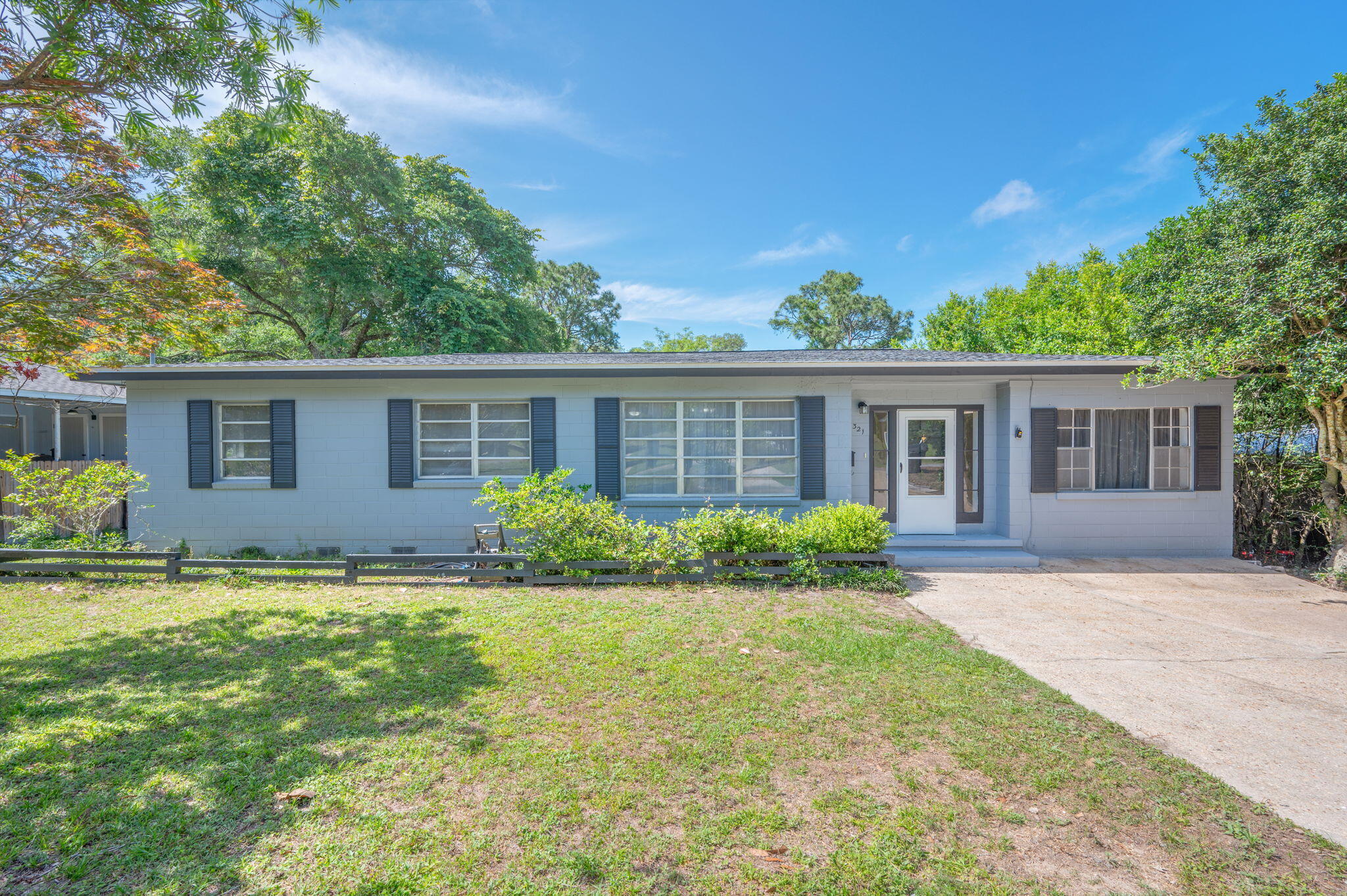 HALF MILE TO THE BAY | 2022 ROOF | BONUS ROOM | LARGE FENCED YARD | PRIME LOCATION 

Nestled in the heart of desirable Valparaiso and located just one half mile to the bay and a little over a mile of Eglin AFB east gate, this clean, comfortable, and well-maintained home offers charm and opportunity. 

Built in 1959, this sturdy cement block home has been lovingly cared for by the same family for over 50 years. This 1,384 sq. ft. features 3 bedrooms, 1 full bathroom, and a spacious bonus room/den ideal for a second living area, home office, playroom, or fitness area. Beautiful original wood floors flow throughout the main living areas, and bedrooms with ceiling fans in every room. A large laundry and storage room adds everyday convenience and organization. For peace of mind, there is new 2022 roof and added vapor barrier in crawl space.

Step outside to a generous fenced backyard, offering endless possibilities for entertaining, gardening, pets, or quiet evenings outdoors with No HOA you can store all your water toys . Two storage sheds provide additional functionality for tools and toys, and the oversized driveway accommodates parking for up to four vehicles. There is a beautiful Japanese maple out front and a producing persimmon tree out back.

Location is everything, and this home delivers. Enjoy evening sunset strolls along the bay, at Glen Argyle Park or dinner at Doc's Oyster Bar. Walk or drive to Lincoln Park to swim, fish, watch fireworks, or utilize the public boat launch. Marion Ruckel Park is also just a short walk away, offering a children's playground, tennis and basketball courts, and picnic pavilions

Whether you are a first-time homebuyer searching for an affordable home in a great school district, military personnel looking for convenience to base, an investor seeking strong upside potential, or someone dreaming of creating a forever home filled with character and charm, this property offers endless possibilities.