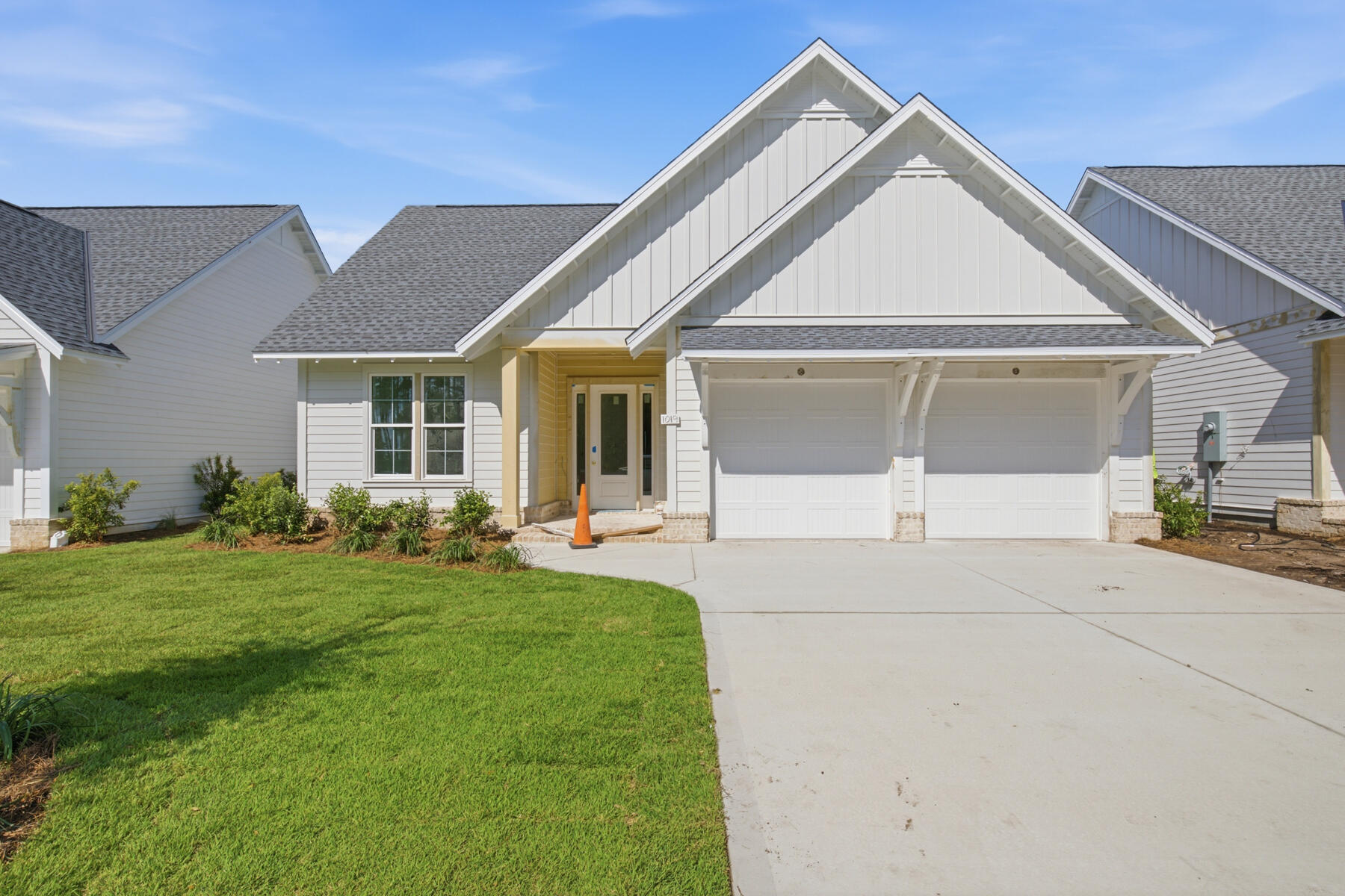 *The new pricing reflects a builder discount of over $50,000.

The Brigette plan offers 2,200 square feet, 4 bedrooms, 3.5 bathrooms, and a 2-car garage, located on Homesite 3 in the recently released Arborview Park neighborhood at Watersound Origins. Positioned on a homesite overlooking a retention pond, the property also includes rear fencing and a screened rear porch designed to take advantage of the water view. Estimated completion is end of Aug '26.

Entering through the foyer, Bedrooms 3 and 4 are positioned toward the front of the home with a shared full bath and nearby powder room, creating separation from the main living spaces. The layout then opens into the central kitchen, dining, and living areas, arranged for both daily use and entertaining.

The kitchen is centered within the home and includes quartz countertops, soft-close cabinetry, under-cabinet lighting, a herringbone tile backsplash extending to the ceiling, and additional cabinetry added to the back of the island for expanded storage and seating. A walk-in pantry and adjacent laundry room with added upper and lower cabinetry provide additional functionality.

The appliance package includes a dual fuel Bosch 36'' range with vent hood, microwave drawer built into the island, Bosch refrigerator, dishwasher, and a tankless water heater as part of the natural gas package. A gas stub has also been added for a future grill connection at the rear porch. tiled shower, quartz surfaces, and porcelain tile flooring. Bedroom 2 is separately located at the rear right side of the home with its own adjacent bath, creating an additional private guest suite option.

Additional features include 10-foot ceilings, luxury vinyl plank flooring throughout the main living areas, crown molding, melamine wrapped wood shelving systems in all closets and pantry spaces, pull-down attic stairs, and Hardiplank siding with heirloom brick detailing.

Located within Watersound Origins, Arborview Park provides access to the Origins Golf Course, Village Commons, trails, and community amenities.