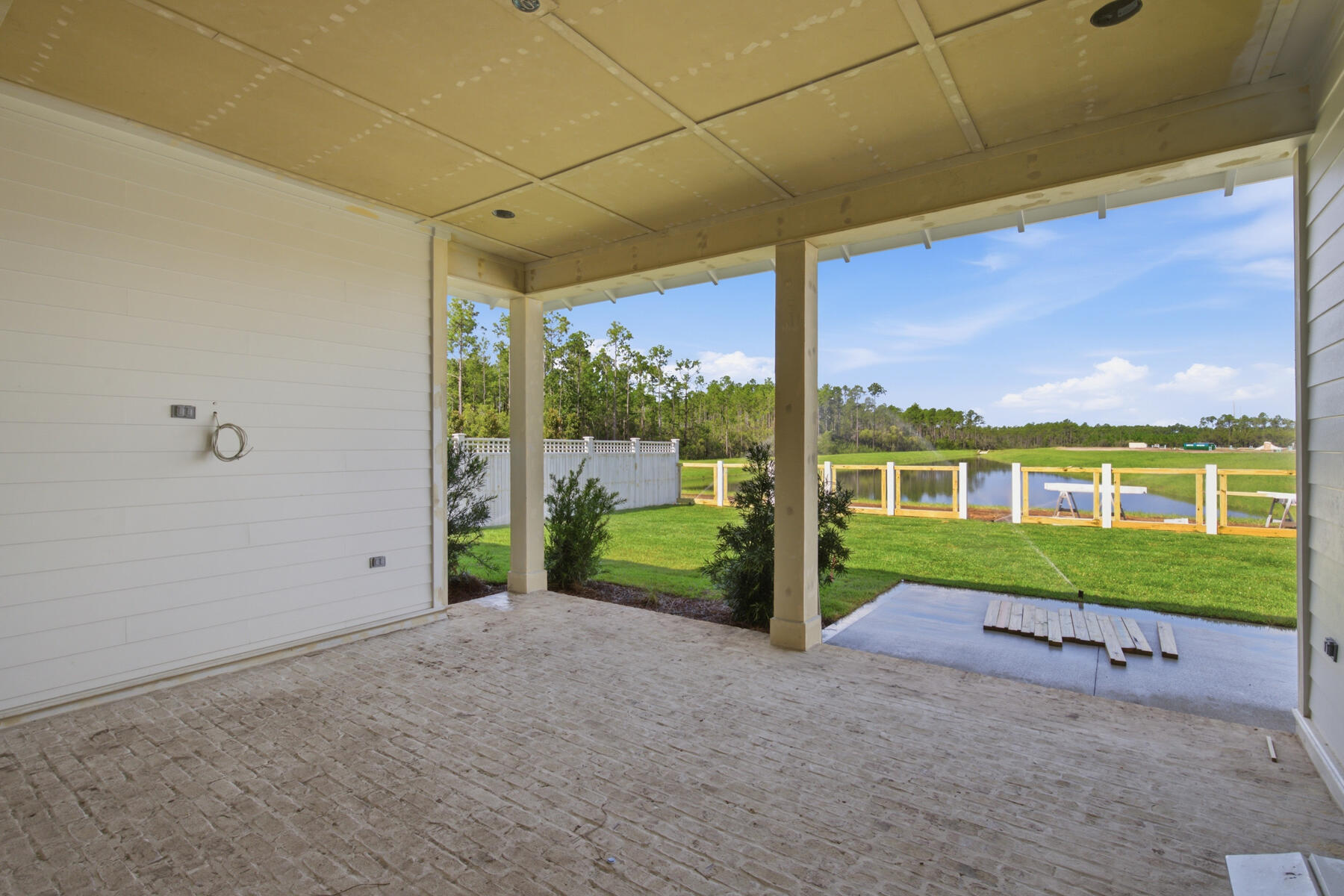 *The new pricing reflects a builder discount of over $50,000.

The Brigette plan offers 2,200 square feet, 4 bedrooms, 3.5 bathrooms, and a 2-car garage, located on Homesite 3 in the recently released Arborview Park neighborhood at Watersound Origins. Positioned on a homesite overlooking a retention pond, the property also includes rear fencing and a screened rear porch designed to take advantage of the water view. Estimated completion is end of Aug '26.

Entering through the foyer, Bedrooms 3 and 4 are positioned toward the front of the home with a shared full bath and nearby powder room, creating separation from the main living spaces. The layout then opens into the central kitchen, dining, and living areas, arranged for both daily use and entertaining.

The kitchen is centered within the home and includes quartz countertops, soft-close cabinetry, under-cabinet lighting, a herringbone tile backsplash extending to the ceiling, and additional cabinetry added to the back of the island for expanded storage and seating. A walk-in pantry and adjacent laundry room with added upper and lower cabinetry provide additional functionality.

The appliance package includes a dual fuel Bosch 36'' range with vent hood, microwave drawer built into the island, Bosch refrigerator, dishwasher, and a tankless water heater as part of the natural gas package. A gas stub has also been added for a future grill connection at the rear porch. tiled shower, quartz surfaces, and porcelain tile flooring. Bedroom 2 is separately located at the rear right side of the home with its own adjacent bath, creating an additional private guest suite option.

Additional features include 10-foot ceilings, luxury vinyl plank flooring throughout the main living areas, crown molding, melamine wrapped wood shelving systems in all closets and pantry spaces, pull-down attic stairs, and Hardiplank siding with heirloom brick detailing.

Located within Watersound Origins, Arborview Park provides access to the Origins Golf Course, Village Commons, trails, and community amenities.