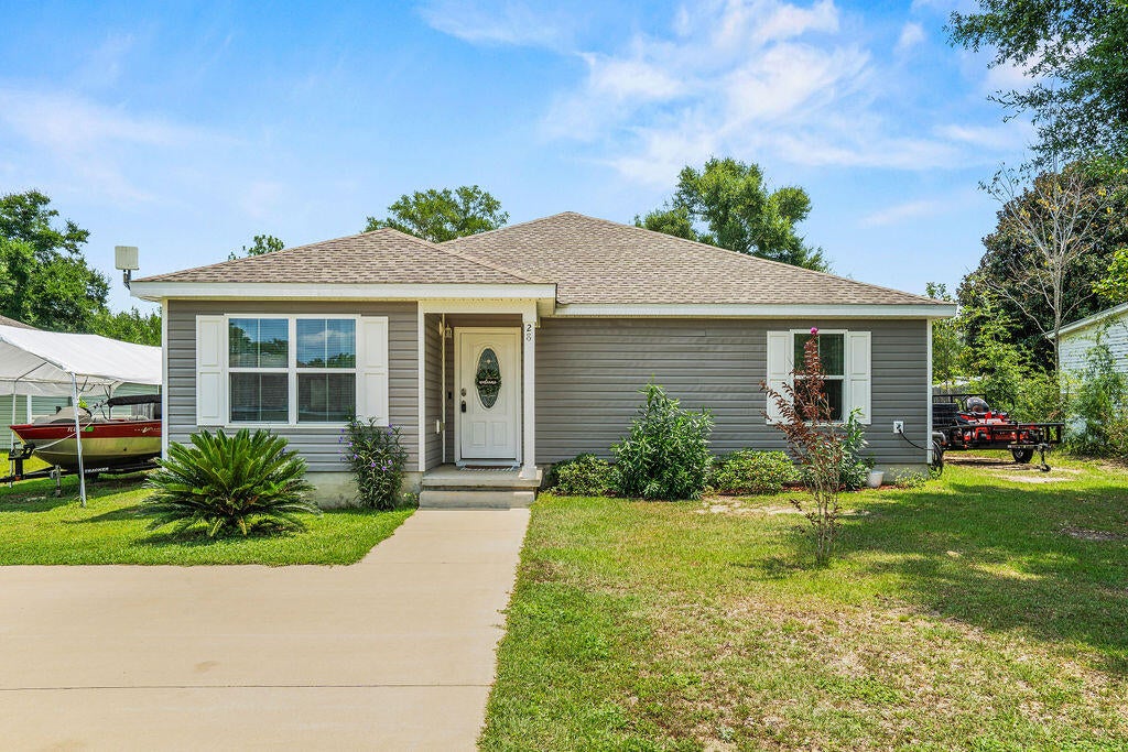 Welcome home to this beautifully maintained 3 bedroom 2 bath home on nearly half an acre with no HOA! The split floor plan offers privacy, while the spacious kitchen provides plenty of cabinet and counter space with granite countertops, and a breakfast bar that's perfect for entertaining. The living room and the primary suite feature elegant tray ceilings. The owners also opted to add additional space in the great room for a bonus office nook. The generous primary suite includes a large walk-in closet, bathroom with dual vanities with granite countertops, a linen closet, and an alcove shower. Step outside to enjoy the spacious, private backyard with plenty of room to park your boat or RV. A 10x12 lofted shed provides plenty of space for storage and the professionally leveled 16x32 pad is ready for your future pool, making it easy to create your own backyard oasis! With generous indoor and outdoor living spaces, no HOA restrictions, and room to make it your own, this property is ready to welcome you home!