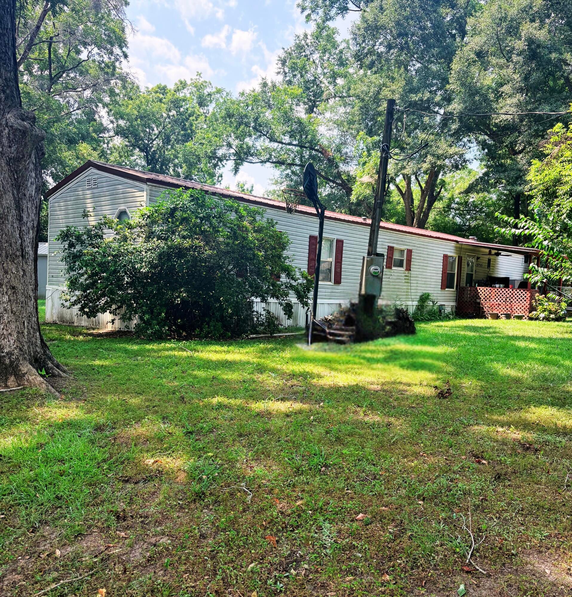 Country Living with Endless Potential in Baker!

Nestled on a spacious 0.70-acre corner lot, this 1996 manufactured home offers 3 bedrooms, 2 bathrooms, and 1,248 square feet of comfortable living space. Whether you're looking for a primary residence, investment property, or your next renovation project, this home offers plenty of potential.

Enjoy the peaceful country setting surrounded by mature pecan and Japanese plum trees, providing shade and seasonal fruit right in your own backyard. The property also features an RV hookup and a durable metal roof, adding convenience and long-term value.

Located in the quiet community of Baker, you'll appreciate the privacy of rural living while remaining just minutes from Crestview, schools, shopping, and Eglin Air Force Base. The spacious corner lot provides ample room for gardening, outdoor entertaining, or future improvements.

Property is being sold As-Is. Don't miss this opportunity to own a slice of country living with space to make it your own. Schedule your private showing today!