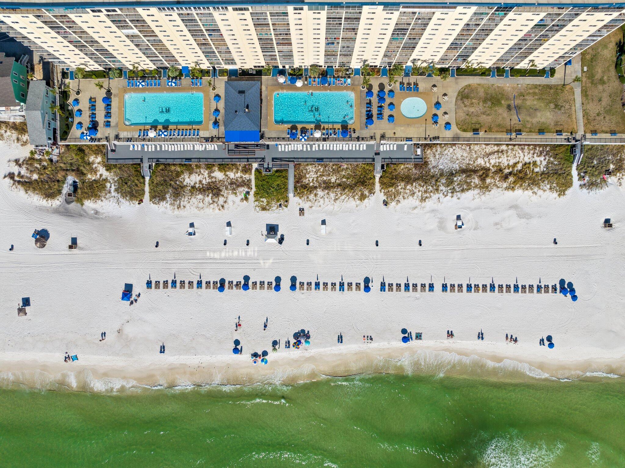Gulf front condo offers 3 BR & 2 BATHS And don't forget about the amazing view!! A rare blend of comfort, convenience & breathtaking natural beauty. Positioned directly along the shoreline, provides unobstructed views of turquoise waters, sugar white sand & unforgettable sunsets right from your living room. Inside, gulf front condos are often designed to maximize light & views, featuring open floor plans, large windows & private balconies facing the water. Enjoy amenities such as 2 beachfront pools, tike bar, hot tub, fitness center, outside grill area, game room, pool tables. private beach access & gated parking. Restaurants, shopping & entertainment near by, St. Andrews Park & also including, Nashville's Tootsie's that opens before Spring 2026.