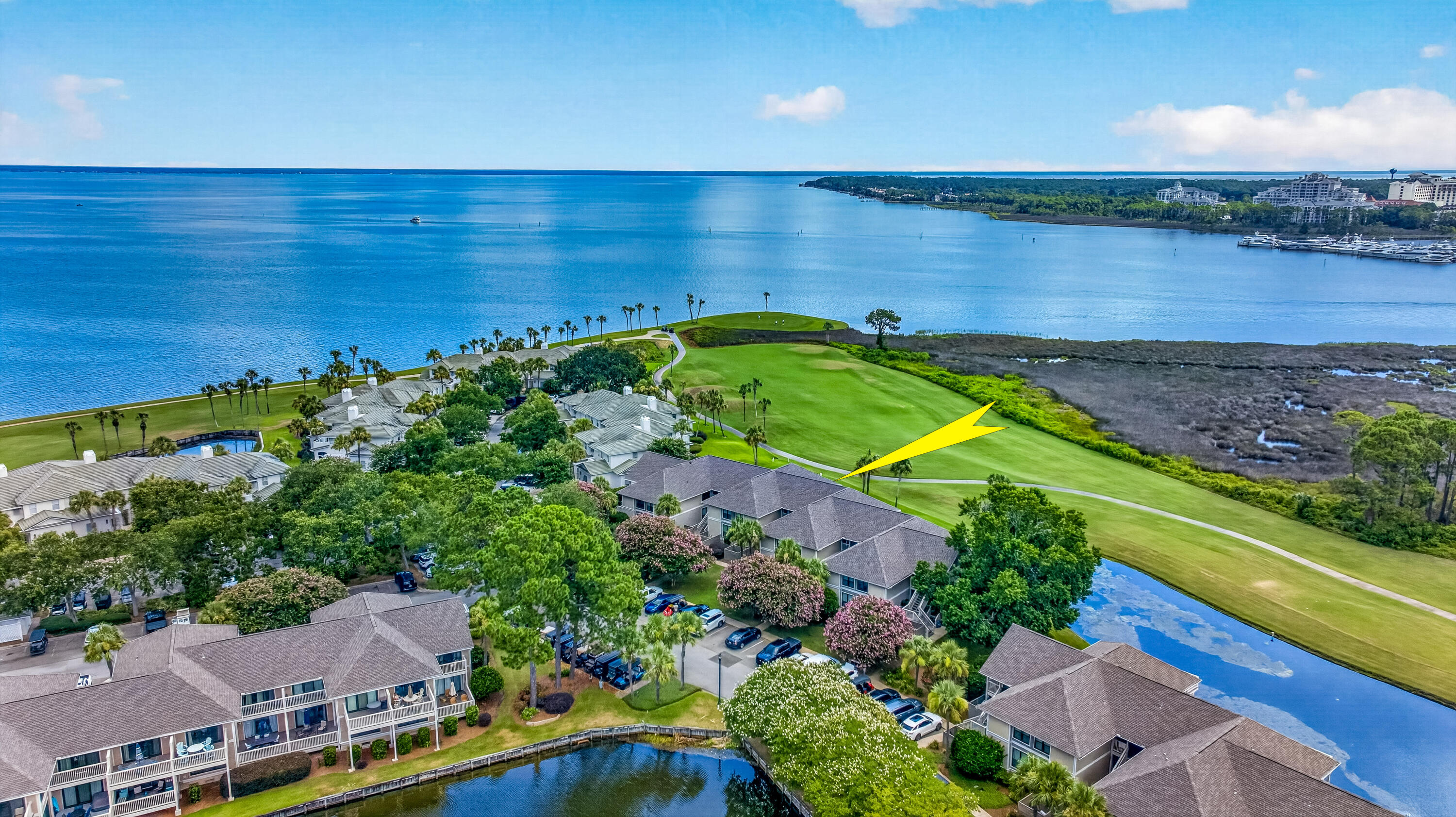 FURNISHED! GOLF CART INCLUDED! BAY, MARINA & GOLF COURSE VIEWS! Discover 824 Harbour Point Drive, a furnished, cosmetically enhanced 2-bedroom, 2-bath bay-view condominium located on the second level within the gated and golf cart community, Sandestin® Golf & Beach Resort in Miramar Beach, Florida. This turnkey coastal retreat showcases breathtaking Choctawhatchee Bay, marina, and golf course views from two expansive private balconies, creating the perfect setting for sunrises, sunsets, and effortless Emerald Coast living. The open-concept floor plan features abundant natural light, tasteful updates, stylish furnishings, and numerous improvements, including but not limited to 2025 updates such as new windows, exterior doors, attic insulation, a completely new HVAC duct system, HALO air purifier, and additional cosmetic enhancements. Ideal as a primary residence, second home, or short-term rental investment. Located in desirable Harbour Point, this residence overlooks the 14th hole of The Links Golf Course, one of four championship golf courses within Sandestin. Harbour Point is one of the few resort communities with its own private community pool. A golf cart is included, along with access to a community golf cart parking area, making it easy to enjoy a scenic ride or leisurely walk to the sugar-white sand beaches and emerald waters of the Gulf of America. Enjoy Sandestin resort amenities (https://www.sandestin.com/sandestin-map?utm_source=chatgpt.com) ... including golf, tennis, pickleball, boating, paddleboarding, kayaking, fishing, water sports, a full-service marina, resort pools, trails, Baytowne Wharf, waterfront dining, shopping, entertainment, festivals, and year-round events. Centrally located near Grand Boulevard, Scenic Highway 30A, Destin, Santa Rosa Beach, Freeport, Niceville, Fort Walton Beach, Panama City Beach, Eglin Air Force Base, Topsail Hill Preserve State Park, Grayton Beach State Park, and Point Washington State Forest. A rare opportunity to own a furnished, turnkey bay-view condominium in one of Walton County's most desired Northwest Florida resort communities. Listing Agent has an ownership interest in the subject property. Property is being sold furnished; exclusions apply including china, crystal, and personal items. Golf, Gym, and Beach Club Memberships are in addition to the association due(s). Buyers shall verify any and all information.