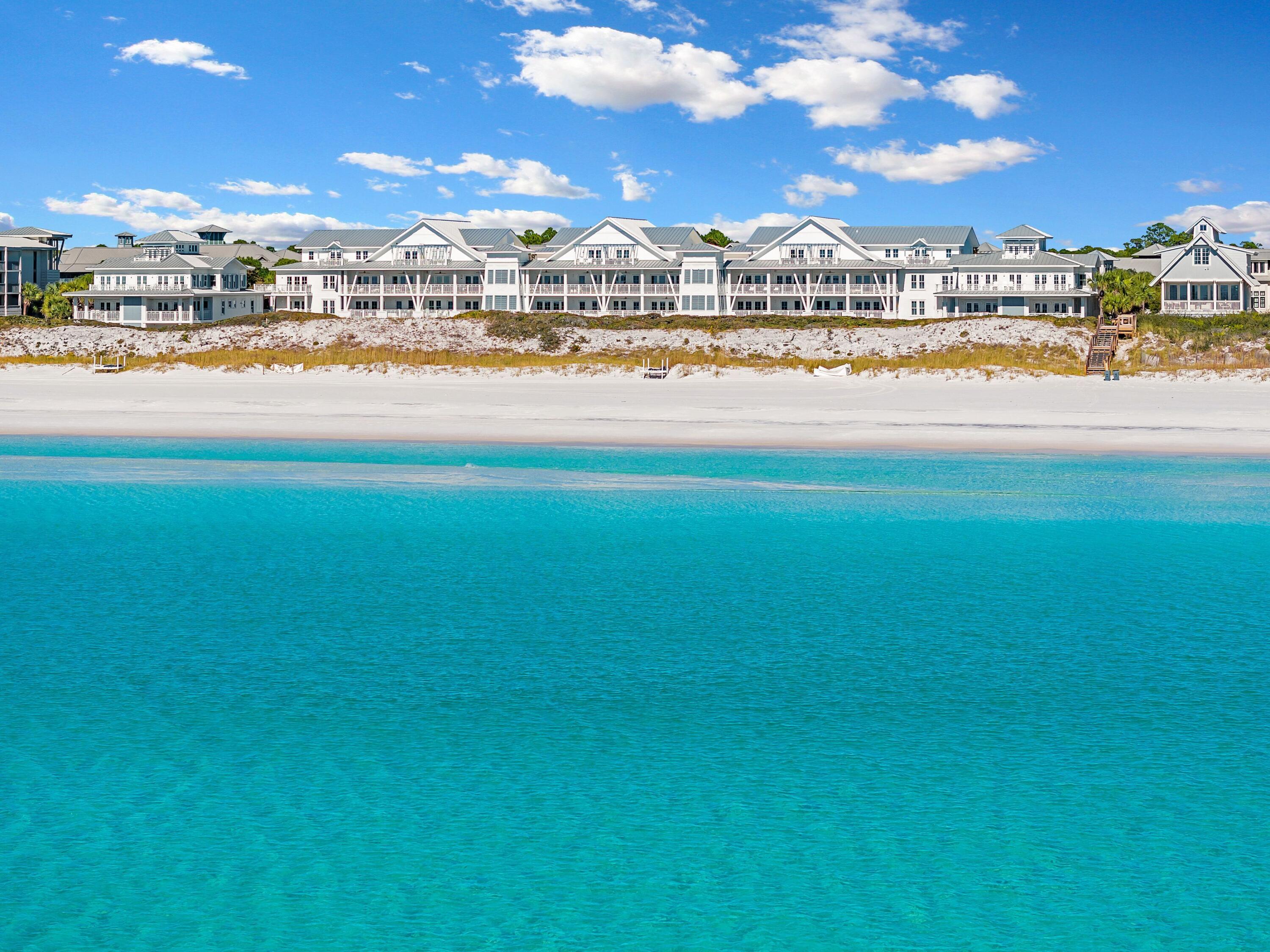 Welcome to one of the most desirable Gulf-front residences in all of WaterColor. Perfectly positioned on the first level of this intimate beachfront condominium, Unit 8 offers an exceptionally rare combination of direct walk-out access to the building's exclusive Gulfside pool, immediate access to the sugar-white sands of the Emerald Coast, and breathtaking panoramic Gulf views--all within one of 30A's most prestigious resort communities. Unlike upper-floor residences, this home lives much like a true beachfront retreat, seamlessly blending indoor and outdoor living. Step directly from your private porch to the pool deck, then continue just a few steps farther to the beach, creating an effortless coastal lifestyle that is seldom found among luxury Gulf-front condominiums.

Ideally positioned between WaterColor and Seaside, Residence 8 spans approximately 2,560 square feet across two levels and lives more like a beachfront home than a condominium. Showcasing sweeping Gulf of Mexico views, the residence features three bedrooms, three full bathrooms, and a bonus bunk room with custom bunks, creating the perfect layout for family enjoyment and strong rental performance.

Extensively updated and offered fully furnished, the residence is truly turnkey. Recent improvements include a beautifully renovated kitchen, custom inset cabinetry throughout, upgraded countertops, designer furnishings, and brand-new windows and doors that enhance both aesthetics and functionality while maximizing natural light and Gulf views.

Designed to embrace its extraordinary beachfront setting, the home features two spacious covered porches that provide multiple outdoor living and dining spaces overlooking the emerald waters and sugar-white sand beaches below. Whether enjoying a morning sunrise, afternoon sea breeze, or evening sunset, the expansive porches create a seamless connection between indoor and outdoor living.

Owners enjoy exclusive access to the building's private gulf-side swimming pool just steps from the beach--an amenity rarely found along 30A. Further distinguishing this offering are two covered parking spaces and a dedicated exterior storage unit, providing a level of convenience seldom available in comparable gulf-front residences.

Ownership includes access to WaterColor's unparalleled collection of resort amenities, including the iconic Gulf-front Beach Club, Camp WaterColor's pools, lazy river and waterslides, Western Lake paddleboarding and kayaking, tennis and pickleball courts, beautifully maintained parks, and miles of scenic walking and biking trails throughout the community.

Currently operating as a successful vacation rental, this residence offers the flexibility of immediate income generation while serving as an exceptional second home or legacy family retreat. Combining one of the most desirable locations on 30A, panoramic Gulf views, extensive renovations, private pool access, two covered parking spaces, dedicated storage, and the unmatched WaterColor lifestyle, Residence 8 represents one of the rarest ownership opportunities currently available along the Emerald Coast.