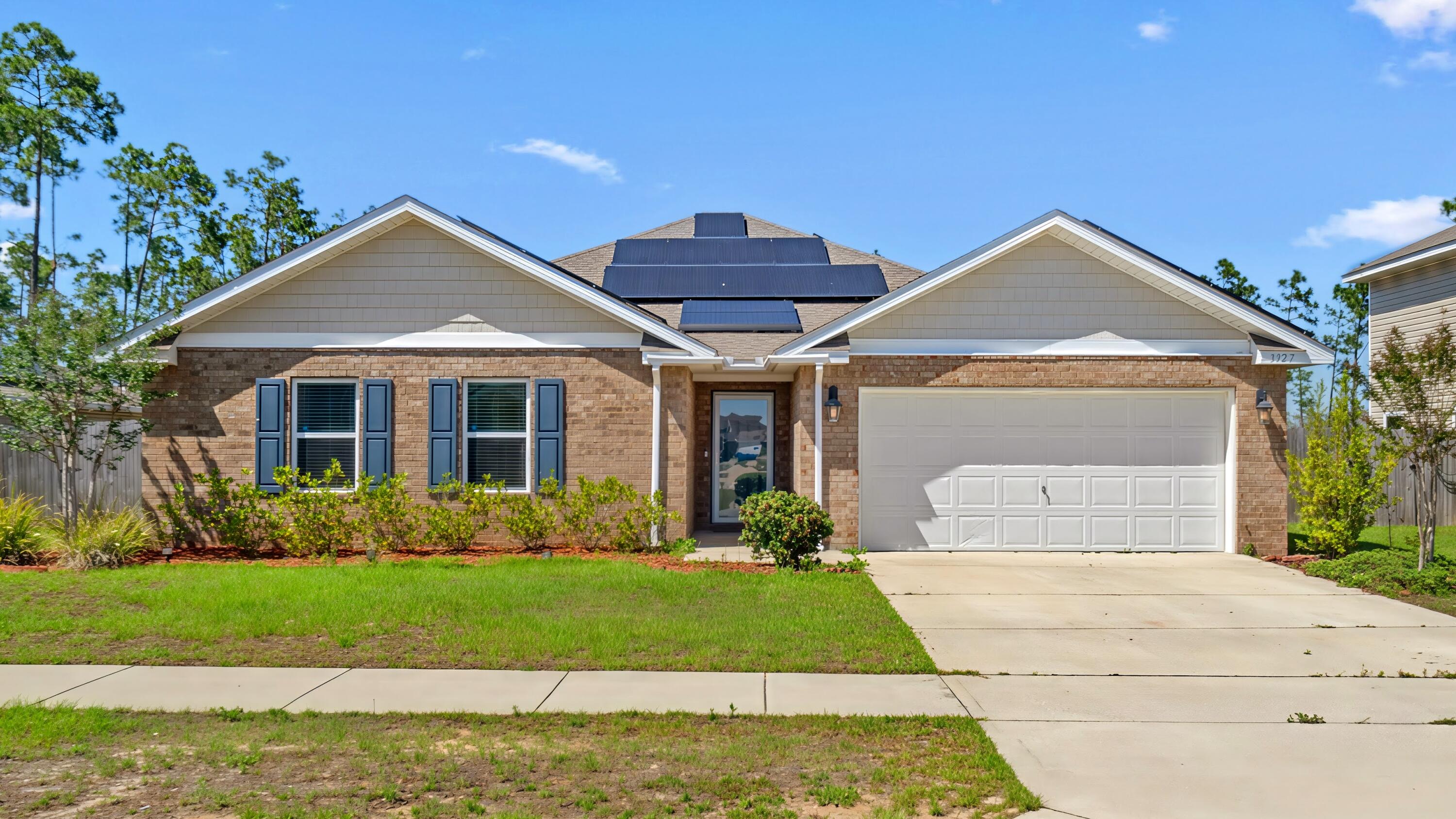 Welcome to a beautifully maintained 4-bedroom, 2-bath home in the desirable Magnolia Hills community. This floor plan perfectly balances comfort and functionality with an open-concept layout and a separate primary wing. The spacious kitchen is the heart of the home, complete with a large island, ample cabinetry, and seamless flow into the living and dining areas - ideal for both entertaining and everyday living. The private primary suite offers a relaxing retreat, while three additional bedrooms provide excellent flexibility for guests, a home office, or dedicated hobby space. Step outside to enjoy the screened-in back porch overlooking the fully fenced backyard, perfect for pets, outdoor recreation, gardening, or gatherings. Additional highlights include solar panels (fully paid off) for improved energy efficiency, a 2-car garage, extra driveway parking, and a storage shed. Conveniently located near Tyndall Air Force Base, shopping, dining, and local beaches, this move-in-ready home combines modern comfort with everyday practicality. Assumable 2.375% VA loan for qualified buyers.