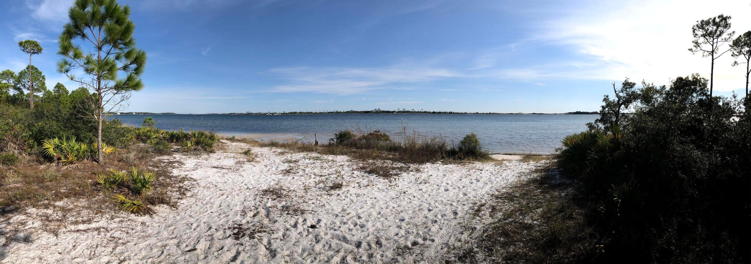 Positioned in Mary Esther, this exceptional 3.38-acre waterfront property presents a rare opportunity with remarkable flexibility. The site is well suited for a private waterfront estate situated on a beach peninsula with a beautiful beach area.
Just minutes from Hurlburt Field, the location is ideal for military members, defense professionals and families seeking proximity to one of the region's key employment centers. Residents and visitors will appreciate the quick connection to Fort Walton Beach and the convenience of being centrally located between Navarre, Gulf Breeze and Destin -- placing shopping, dining, beaches and daily essentials within easy reach