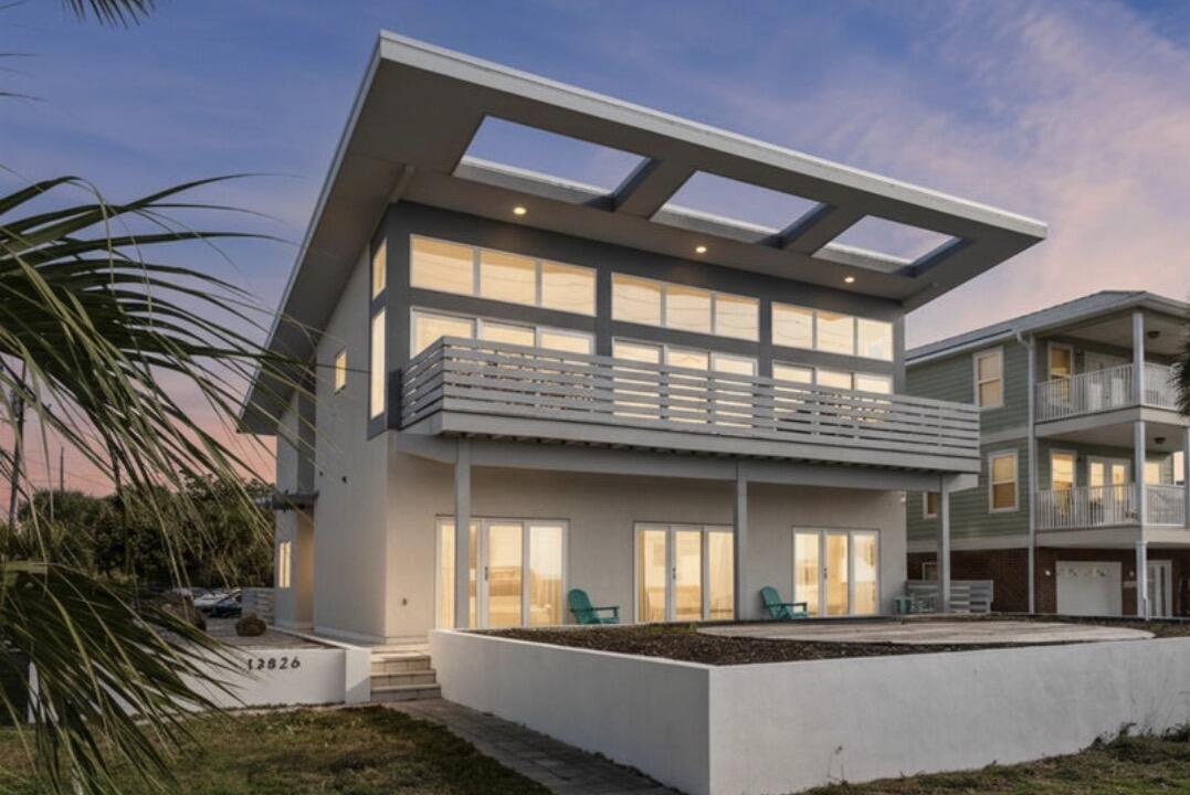 One of the few newer-construction beachfront homes in Bid-A-Wee with UNOBSTRUCTED GULF VIEWS, private beach access, and proven luxury vacation-rental capability. REACH OUT FOR RENTAL HISTORY AND IMPRESSIVE PROJECTIONS!

Designed to capture breathtaking, unobstructed water views, this stunning property showcases the sparkling Gulf from nearly every room.

Expansive windows flood the home with natural light, while the spacious porch and multiple outdoor living areas create the perfect setting for seamless indoor-outdoor entertaining. Wake up to the soothing sound of waves and enjoy sun-drenched interiors in the open-concept living space--ideal for both relaxing and gathering with family and friends.

Step onto the balcony to experience the fresh coastal air and unforgettable sunsets over the water. With its distinctive design and serene beachfront setting, this home embodies the ultimate coastal lifestyle.

Currently operating as a successful vacation rental, the property comfortably sleeps 12 and features 6 spacious bedrooms, 6 full bathrooms, a private pool, and direct private beach access to the sugar-white sands and emerald-green waters of the Gulf. This is an exceptional investment opportunity, second home, or primary residence. Experience the best of the Emerald Coast lifestyle in the heart of PCB!

Buyer to verify all dimensions, fees & written information.